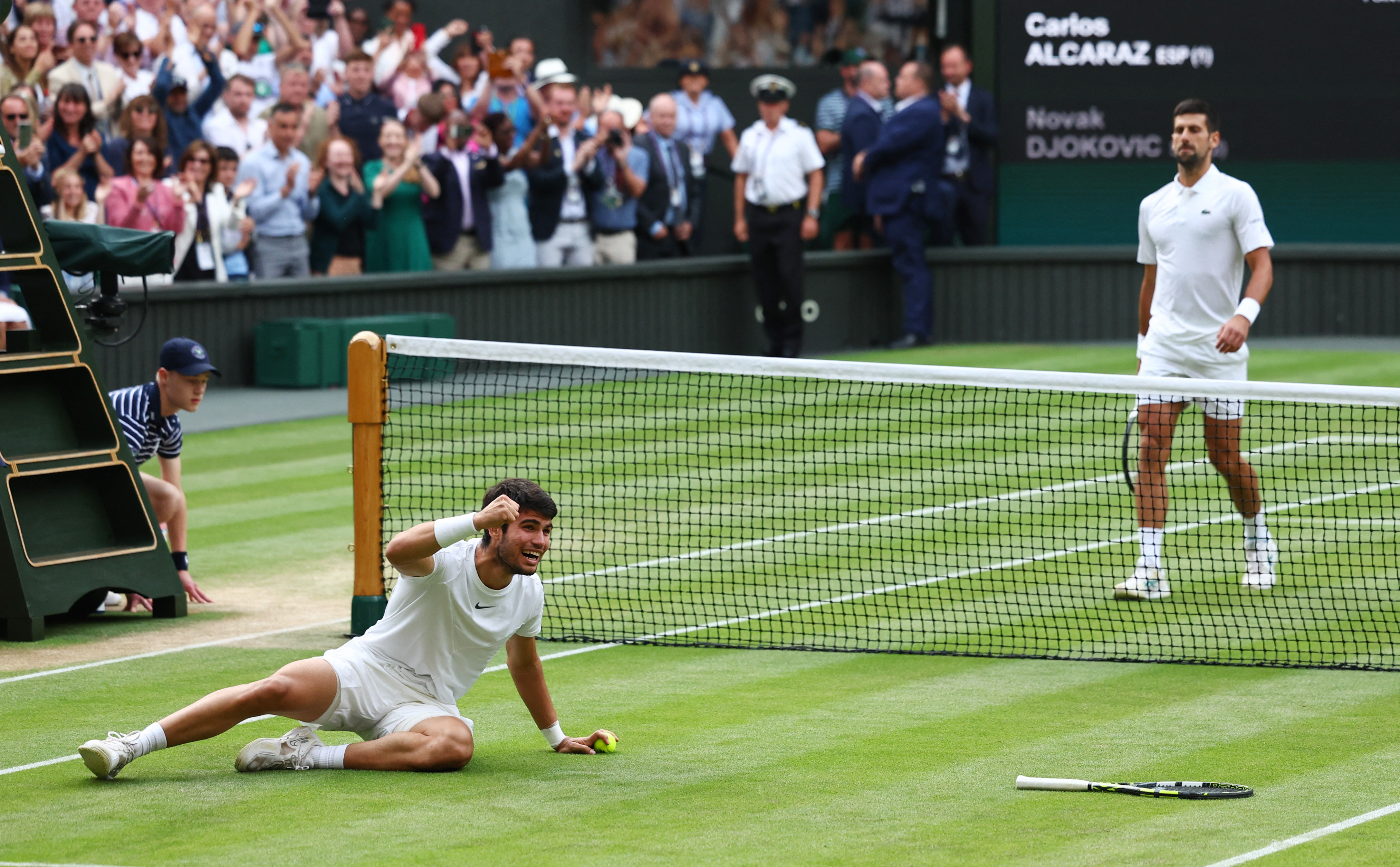 Tennis - Wimbledon - All England Lawn Tennis and Croquet Club, London, Britain - July 16, 2023 Spain's Carlos Alcaraz celebrates after winning his final match against Serbia's Novak Djokovic REUTERS/Toby Melville