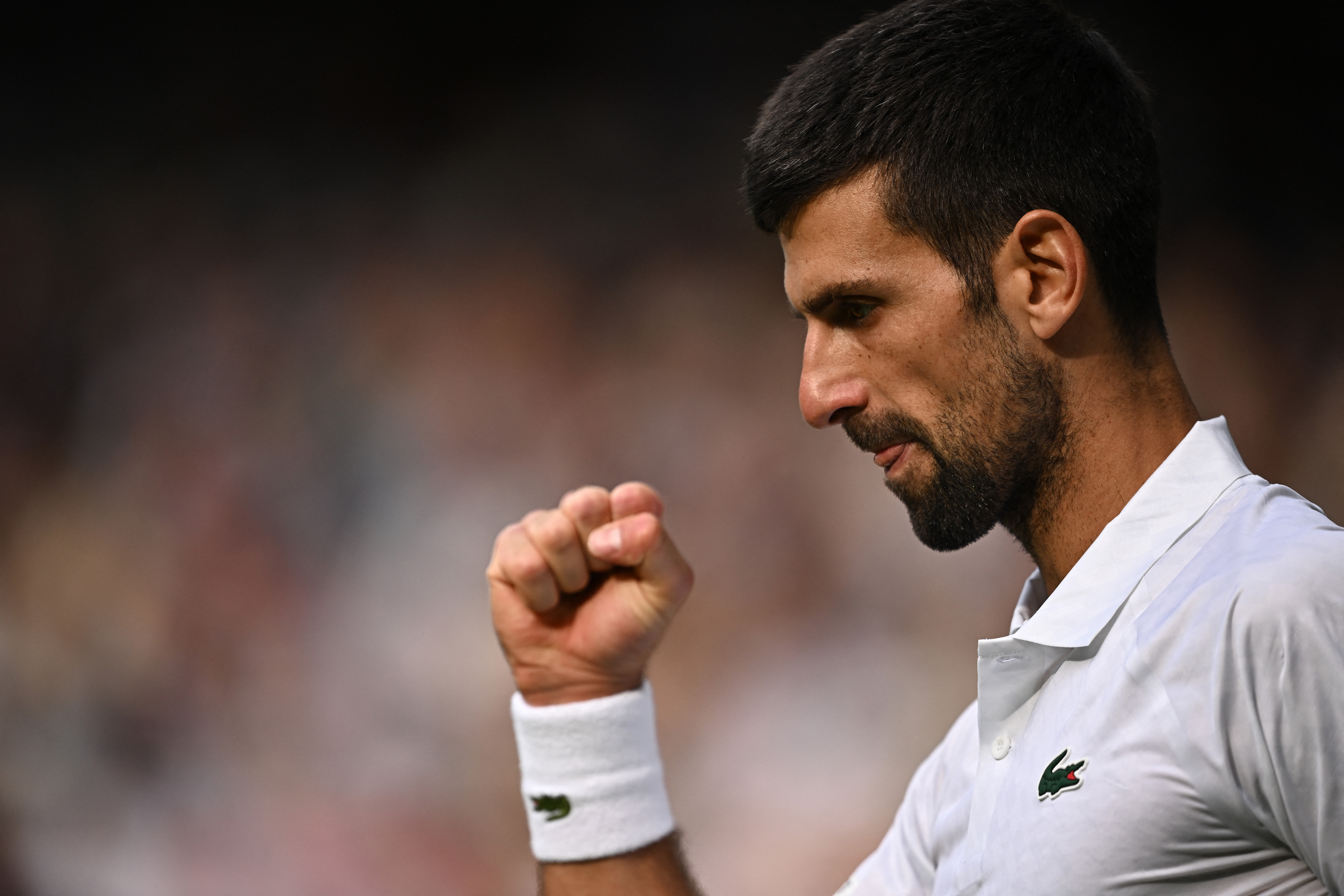 Tennis - Wimbledon - All England Lawn Tennis and Croquet Club, London, Britain - July 16, 2023 Serbia's Novak Djokovic reacts during his final match against Spain's Carlos Alcaraz REUTERS/Dylan Martinez