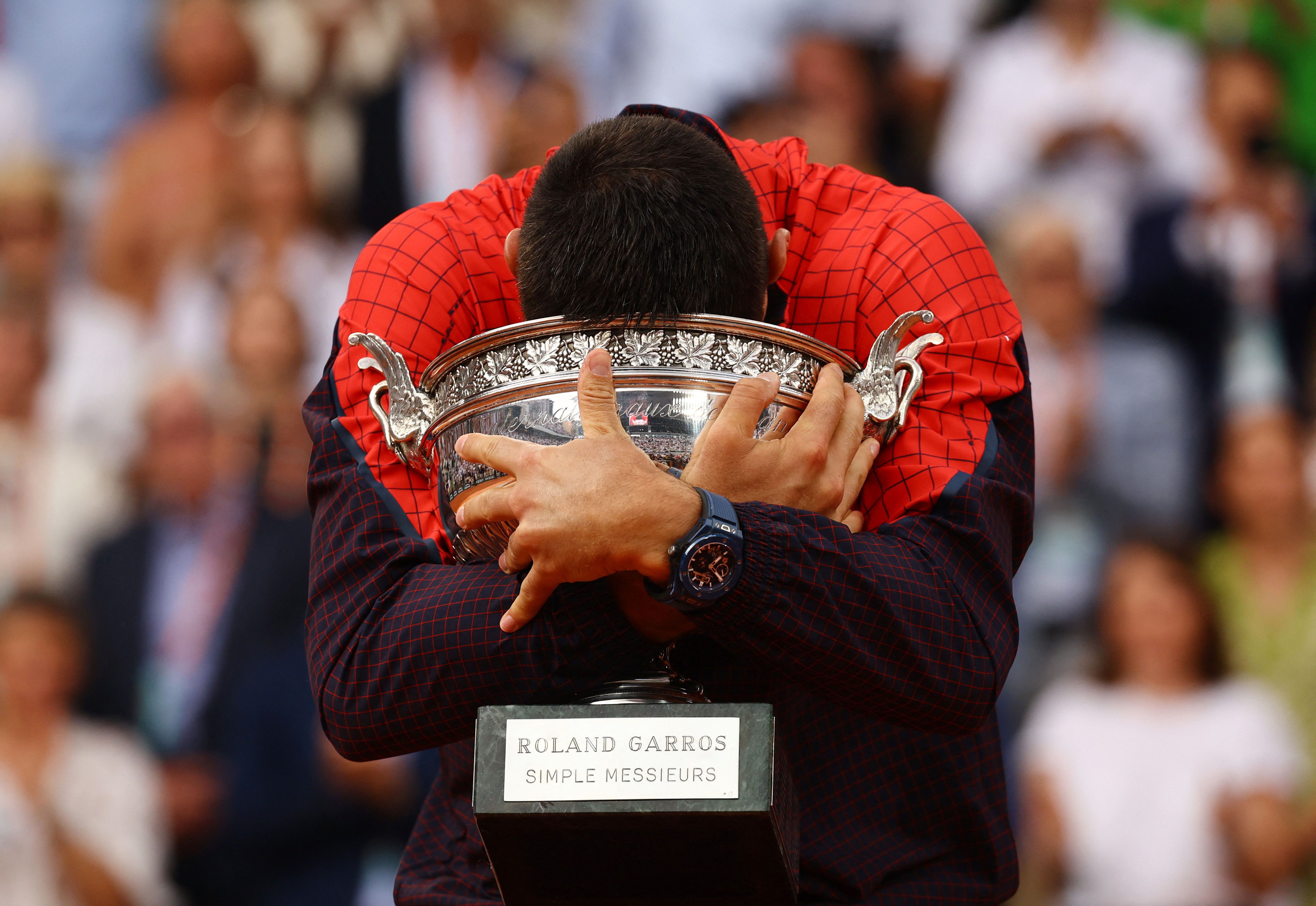 Tennis - French Open - Roland Garros, Paris, France - June 11, 2023 Serbia's Novak Djokovic poses with the trophy after winning the French Open REUTERS/Kai Pfaffenbach