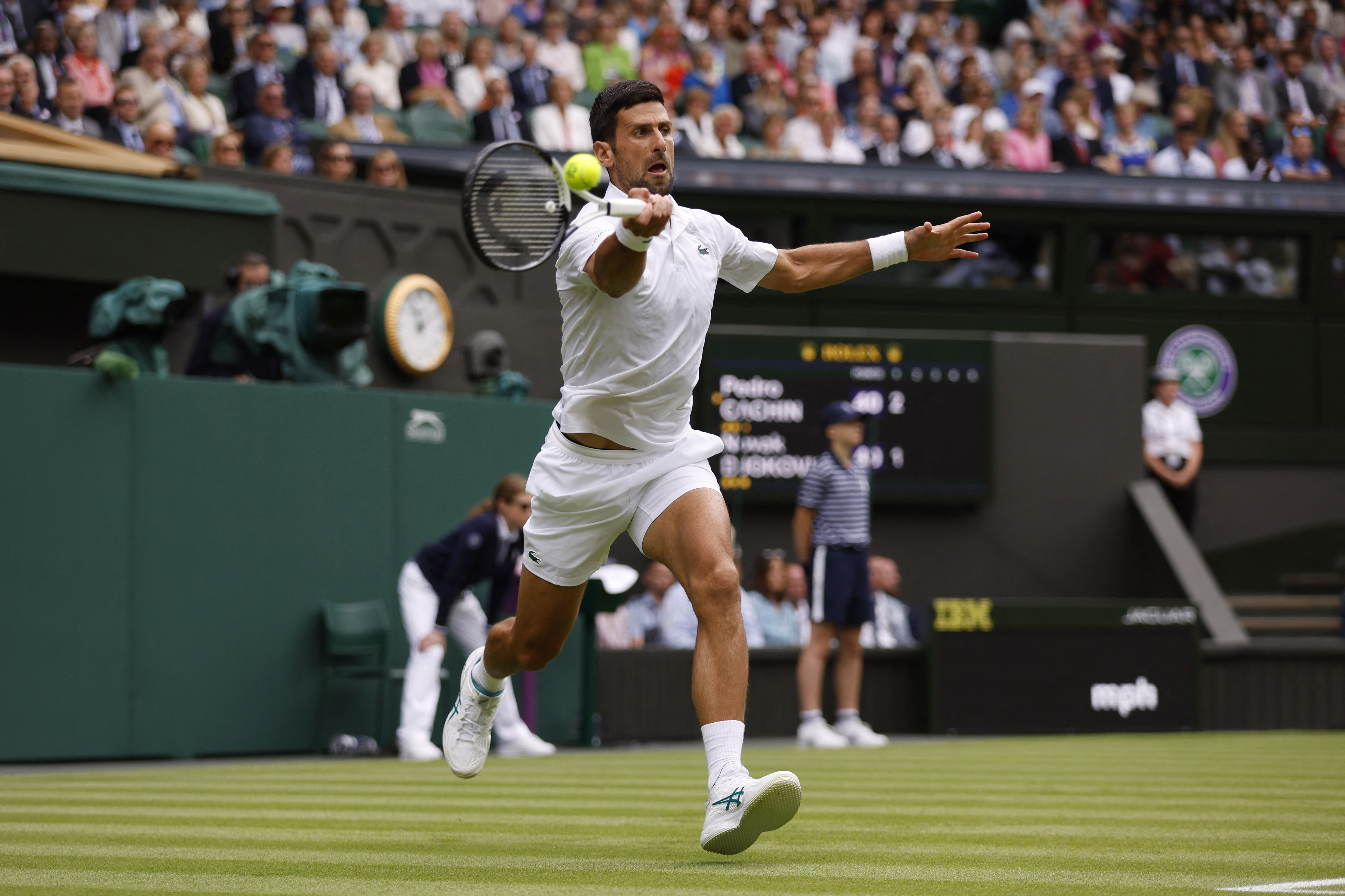 Tennis - Wimbledon - All England Lawn Tennis and Croquet Club, London, Britain - July 3, 2023 Serbia’s Novak Djokovic in action during his first round match against Argentina’s Pedro Cachin REUTERS/Andrew Couldridge