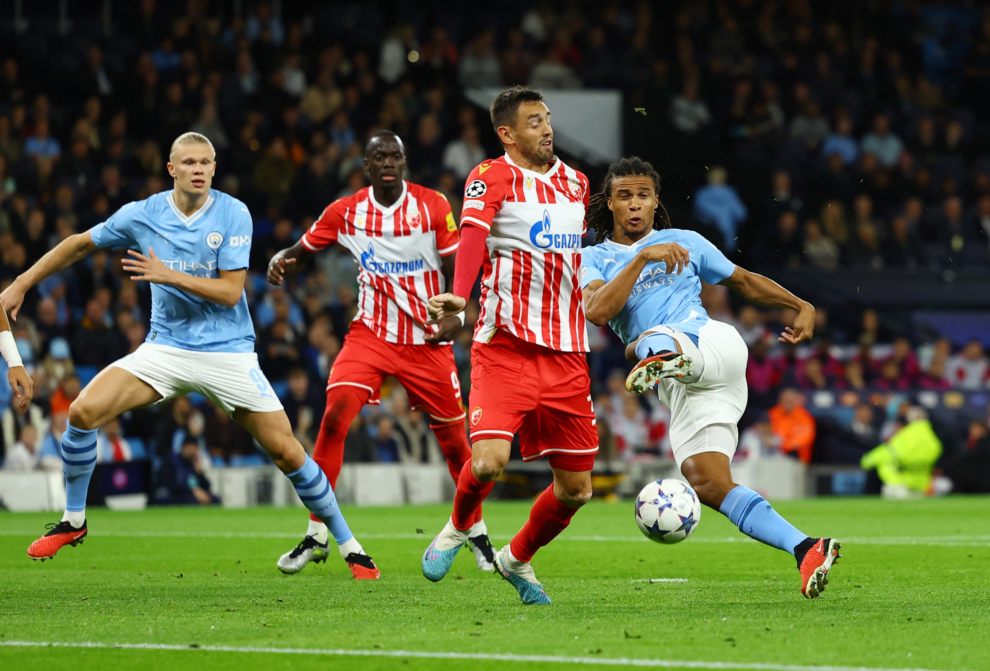 Soccer Football - Champions League - Group G - Manchester City v Crvena Zvezda - Etihad Stadium, Manchester, Britain - September 19, 2023 Crvena Zvezda's Srdjan Mijailovic in action with Manchester City's Nathan Ake REUTERS/Molly Darlington