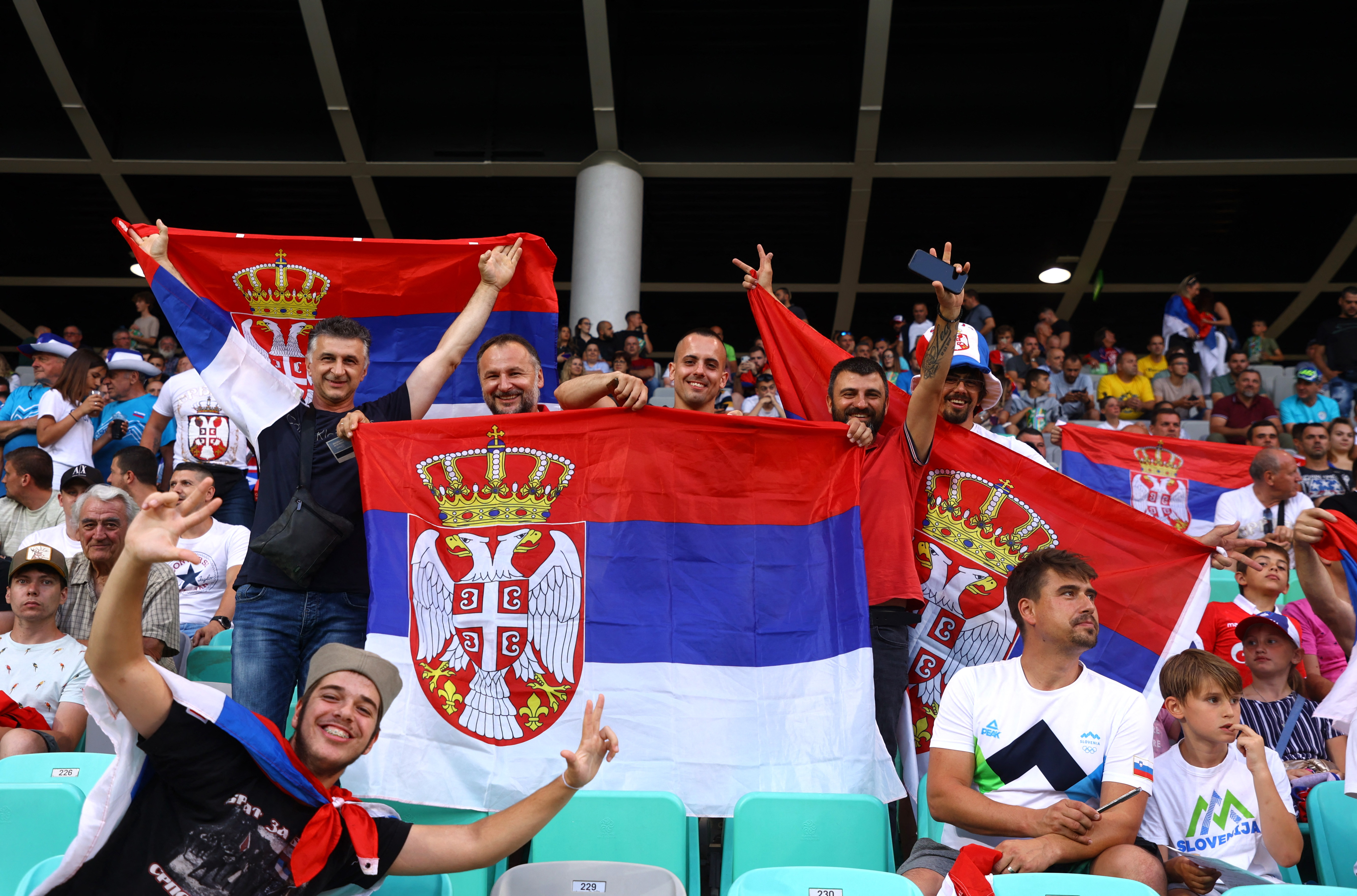 Soccer Football - UEFA Nations League - Group H - Slovenia v Serbia - Stozice Stadium, Ljubljana, Slovenia - June 12, Serbia fans with flags inside the stadium before the match REUTERS/Borut Zivulovic