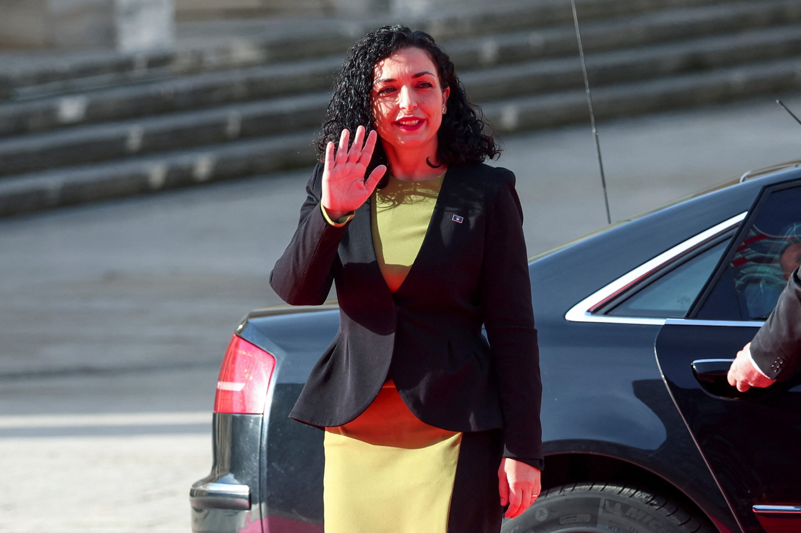 Kosovo's President Vjosa Osmani-Sadriu waves as she arrives for the EU-Western Balkans summit in Tirana, Albania, December 6, 2022. REUTERS/Florion Goga