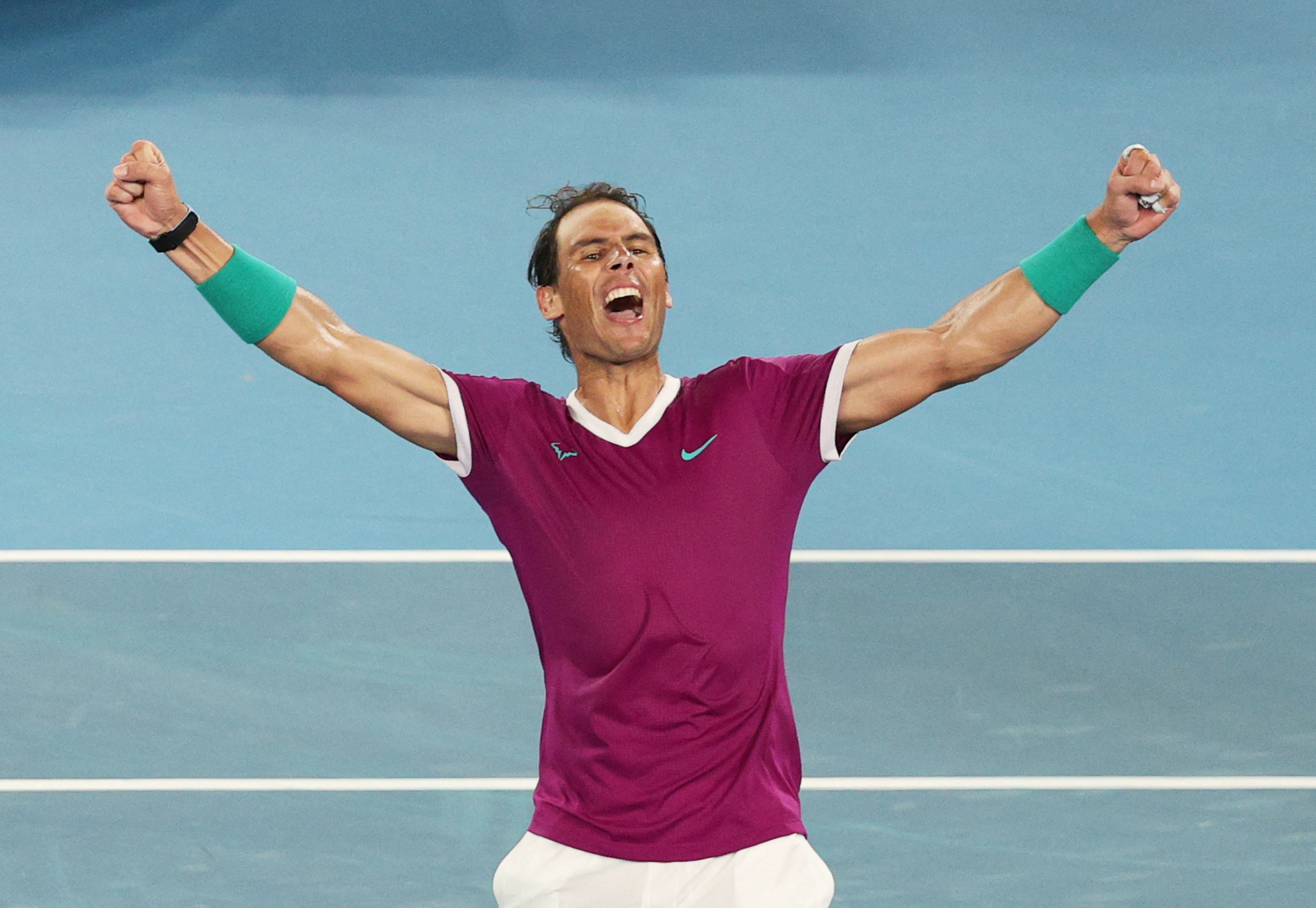 Tennis - Australian Open - Men's Singles Final - Melbourne Park, Melbourne, Australia - January 31, 2022 Spain's Rafael Nadal celebrates winning the final against Russia's Daniil Medvedev REUTERS/Loren Elliott