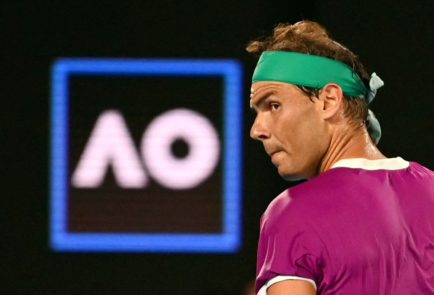 Tennis - Australian Open - Men's Singles Final - Melbourne Park, Melbourne, Australia - January 30, 2022 Spain's Rafael Nadal reacts during the final against Russia's Daniil Medvedev REUTERS/Morgan Sette
