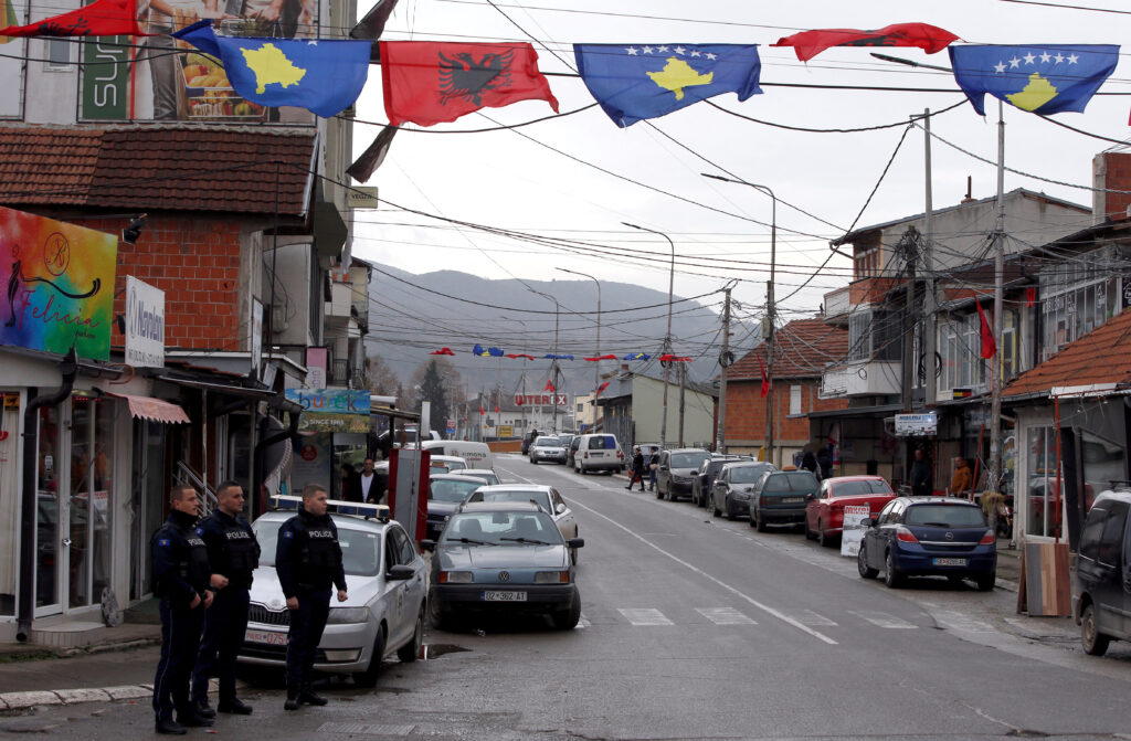 Kosovo police officers patrol in ethnically mixed area in North Mitrovica, Kosovo, December 9,2022. REUTERS/Ognen Teofilovski