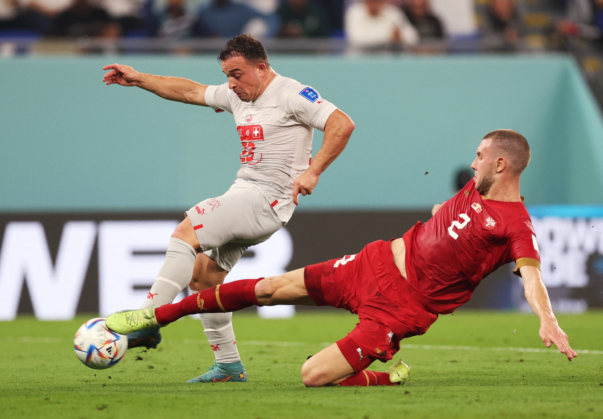Soccer Football - FIFA World Cup Qatar 2022 - Group G - Serbia v Switzerland - Stadium 974, Doha, Qatar - December 2, 2022 Switzerland's Xherdan Shaqiri in action with Serbia's Strahinja Pavlovic REUTERS/Carl Recine