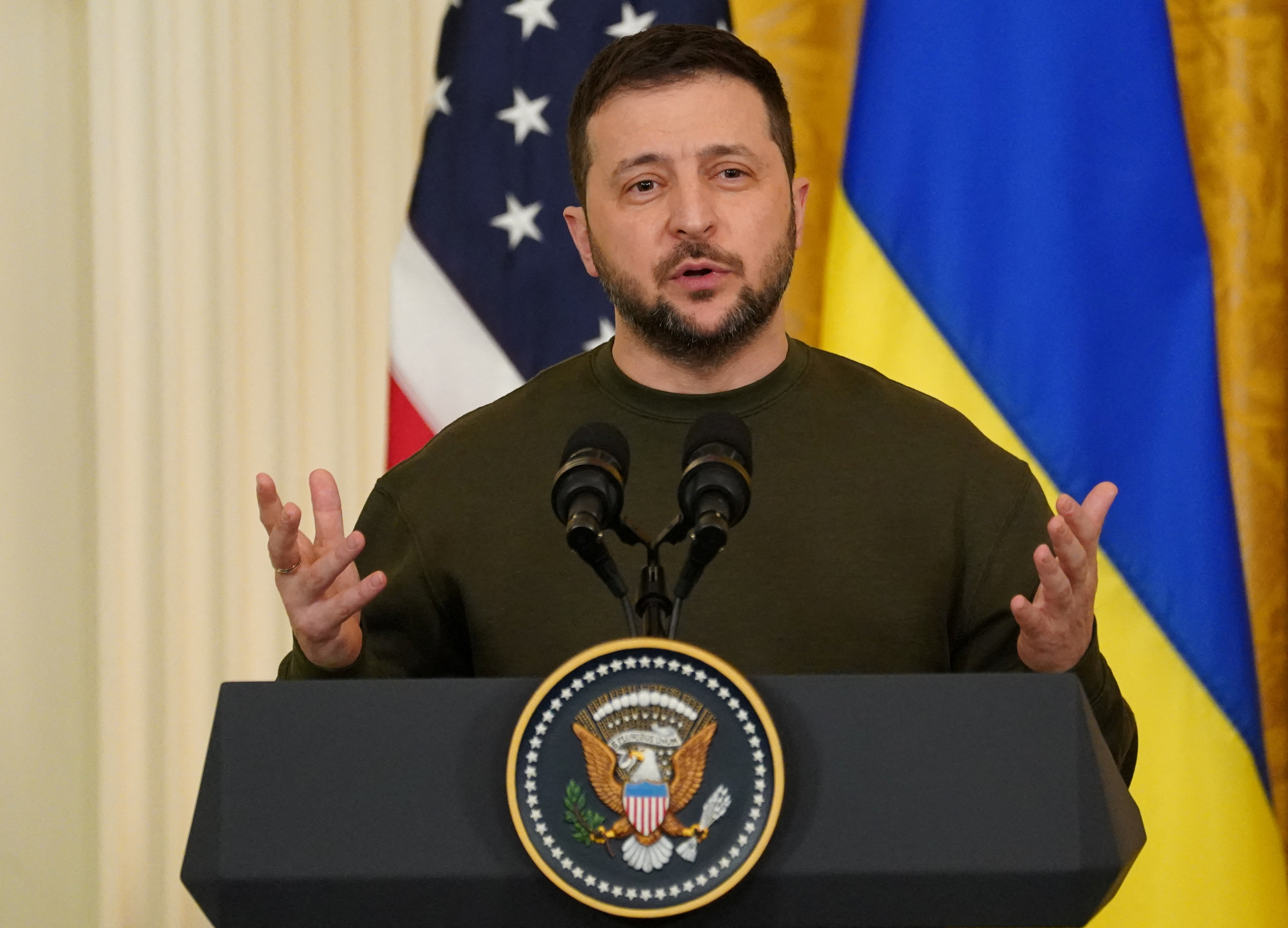 Ukraine's President Volodymyr Zelenskiy speaks during a joint news conference with U.S. President Joe Biden (not pictured) in the East Room of the White House in Washington, U.S., December 21, 2022. REUTERS/Kevin Lamarque