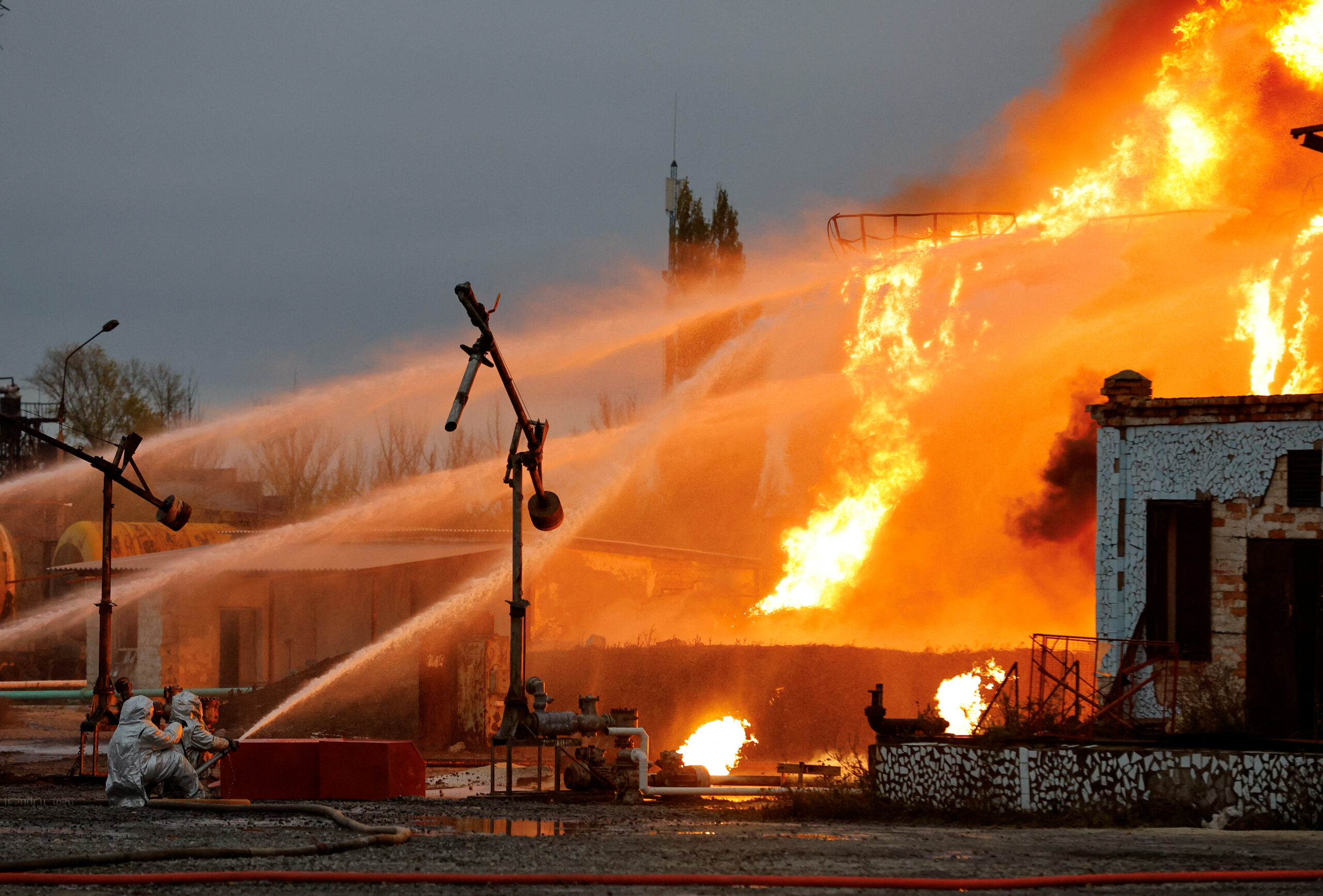 Firefighters work to extinguish fire following recent shelling at an oil storage in the course of Russia-Ukraine conflict in the town of Shakhtarsk (Shakhtyorsk) near Donetsk, Russian-controlled Ukraine, October 27, 2022. REUTERS/Alexander Ermochenko