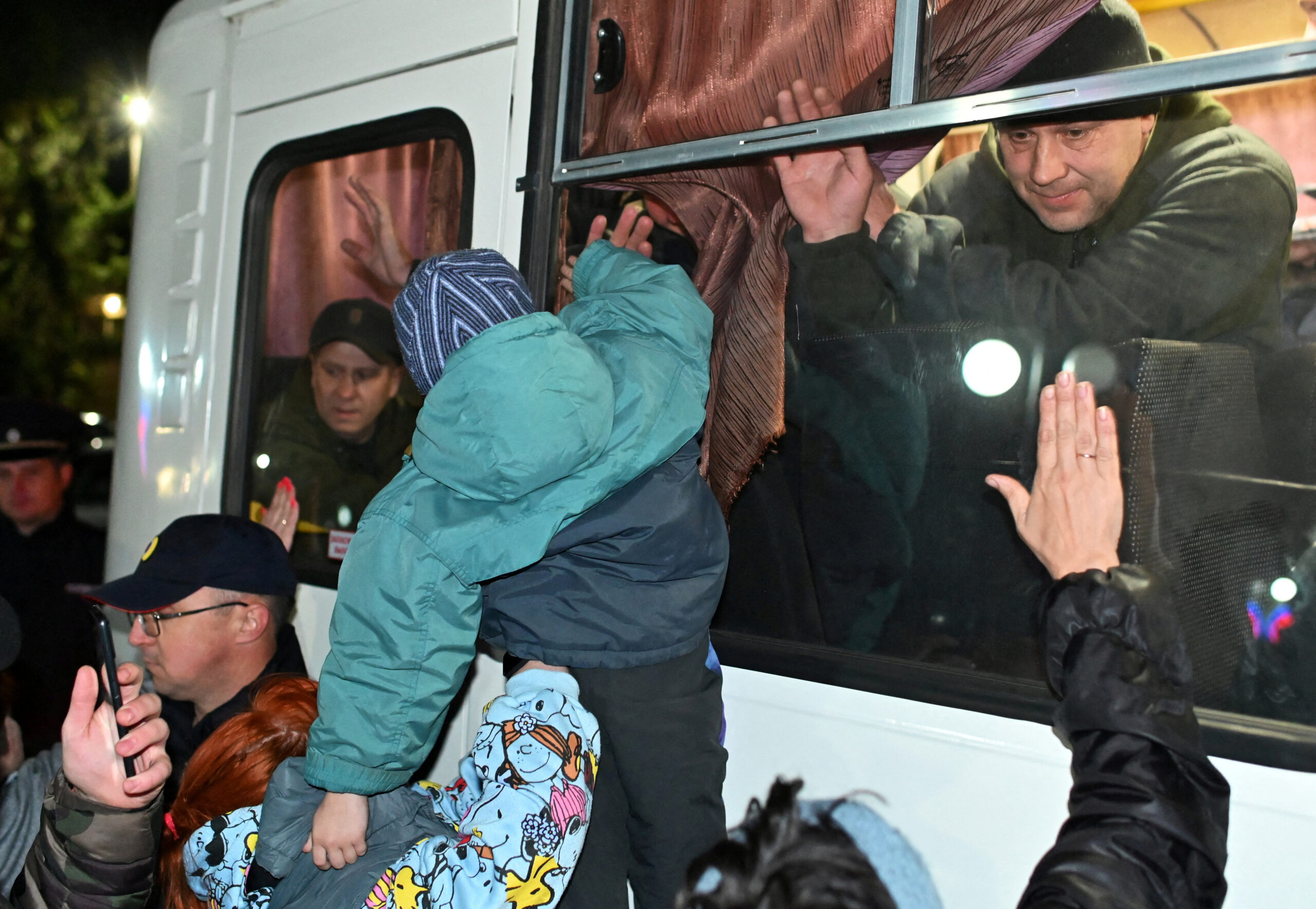 FILE PHOTO: People bid farewell to reservists drafted during the partial mobilisation in the Siberian settlement of Bolsherechye in the Omsk region, Russia September 25, 2022. REUTERS/Alexey Malgavko/File Photo