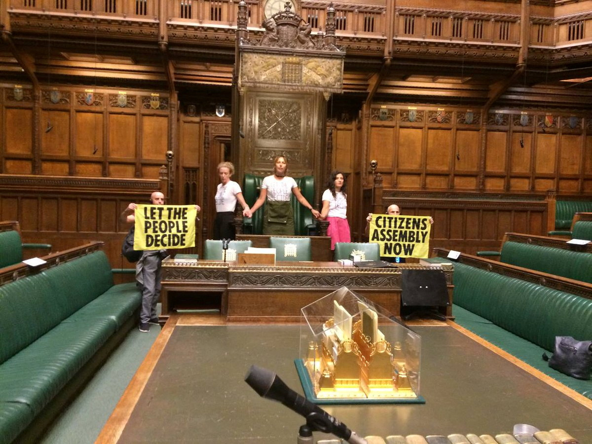 Extinction Rebellion protestors enter parliament's House of Commons chamber