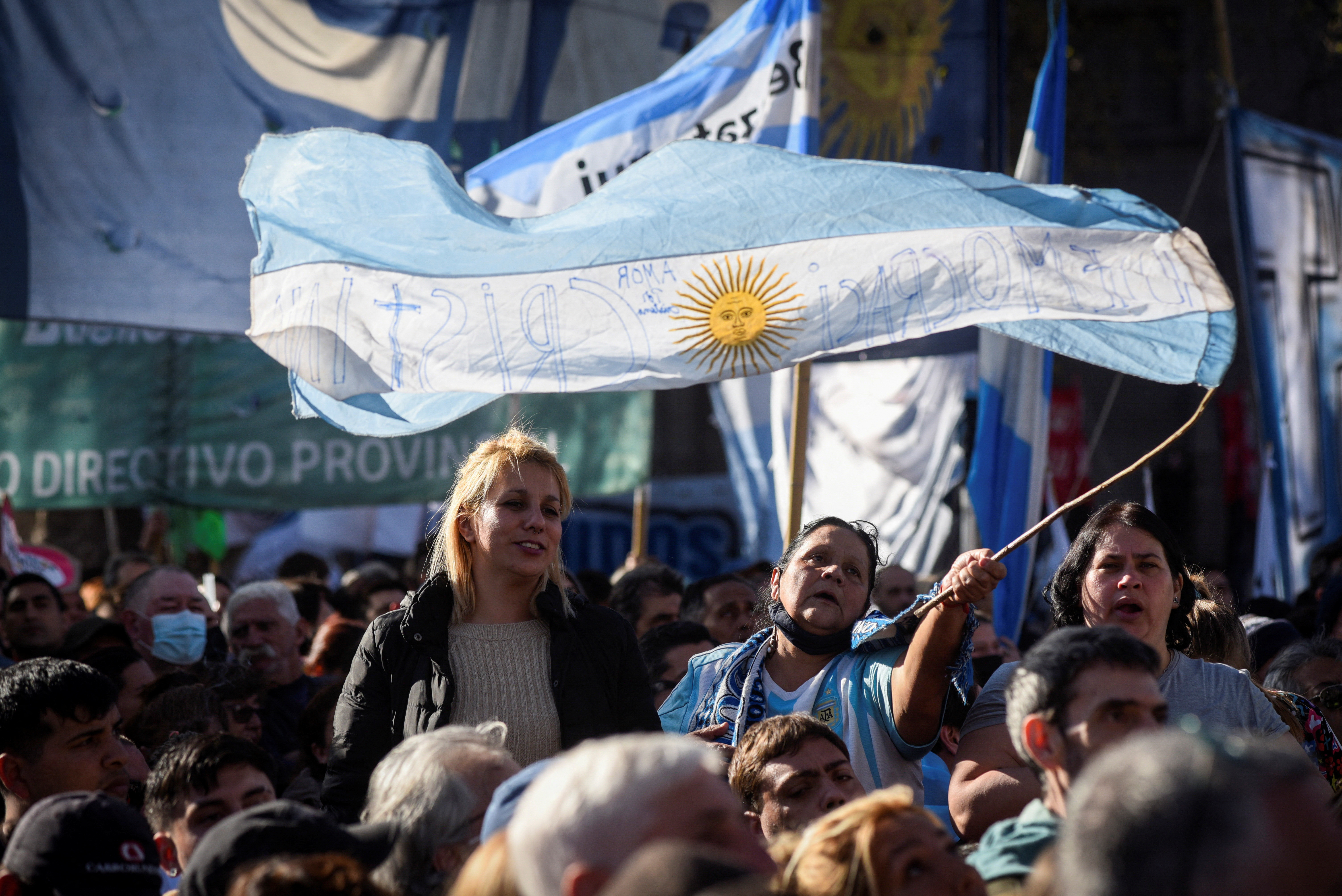 Argentines march to support VP Fernandez after she was pointed at with a gun, in Buenos Aires