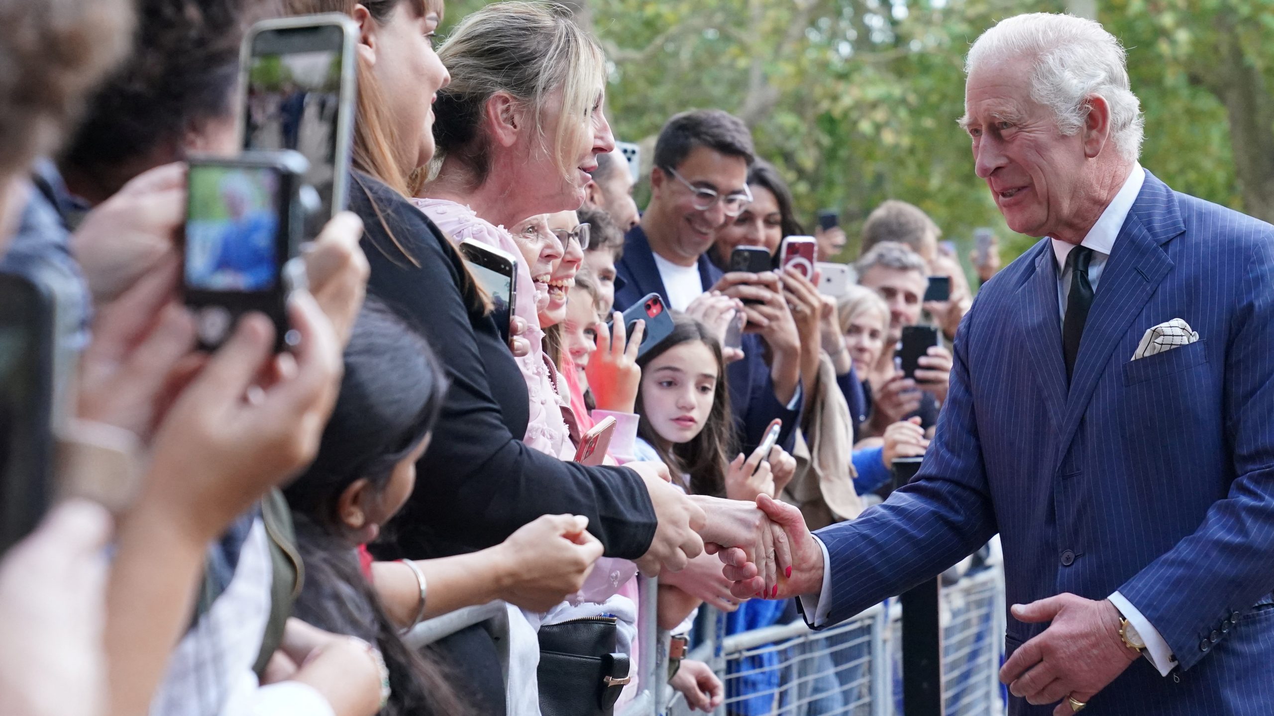 Britain's King Charles meets well-wishers as he returns to Clarence House from Buckingham Palace, following the death of Britain's Queen Elizabeth, in London, Britain, September 10, 2022. Jonathan Brady/PA Wire/Pool via REUTERS