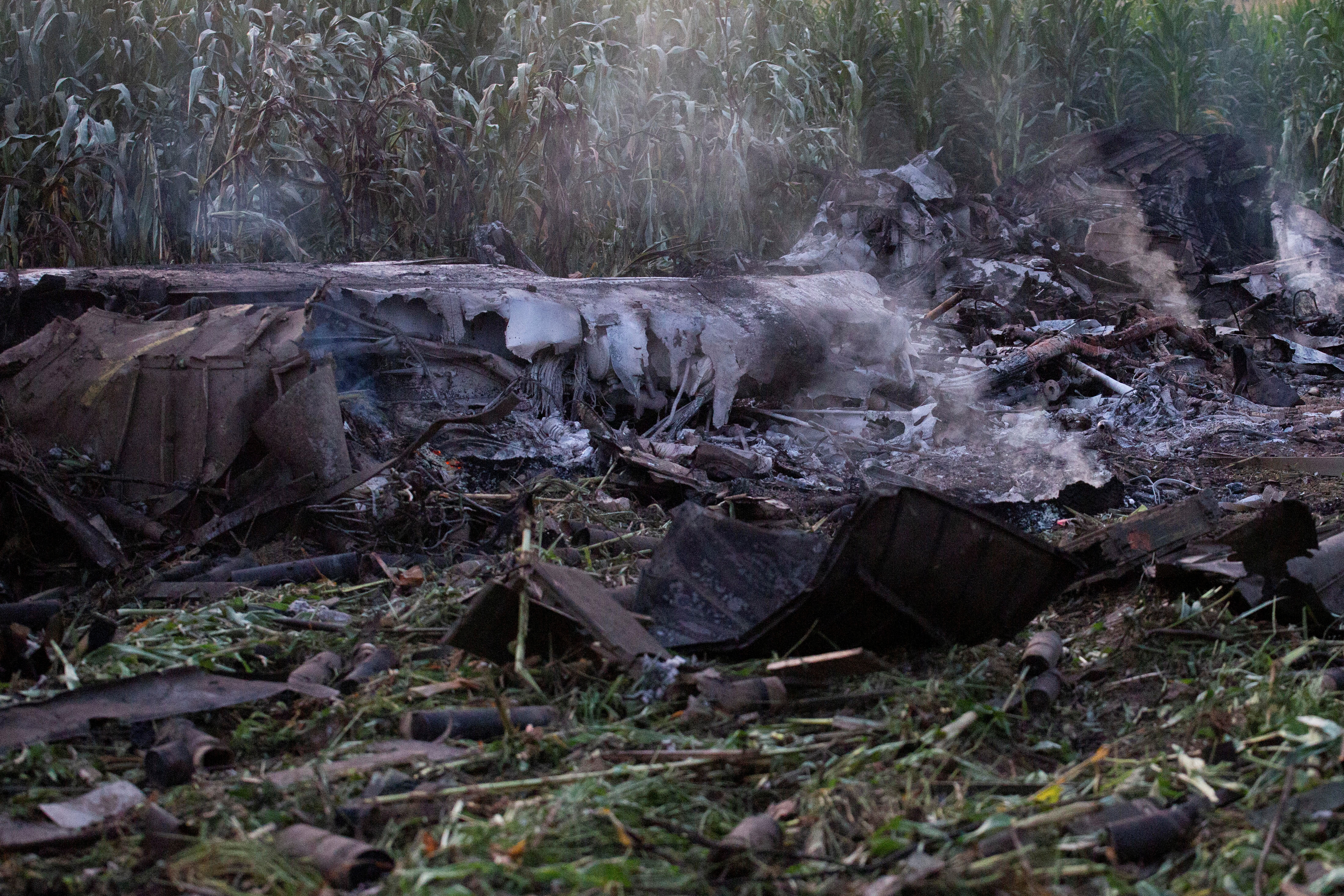 Debris is seen at the crash site of an Antonov An-12 cargo plane owned by a Ukrainian company, near Kavala, Greece, July 17, 2022. REUTERS/Stringer NO RESALES. NO ARCHIVES