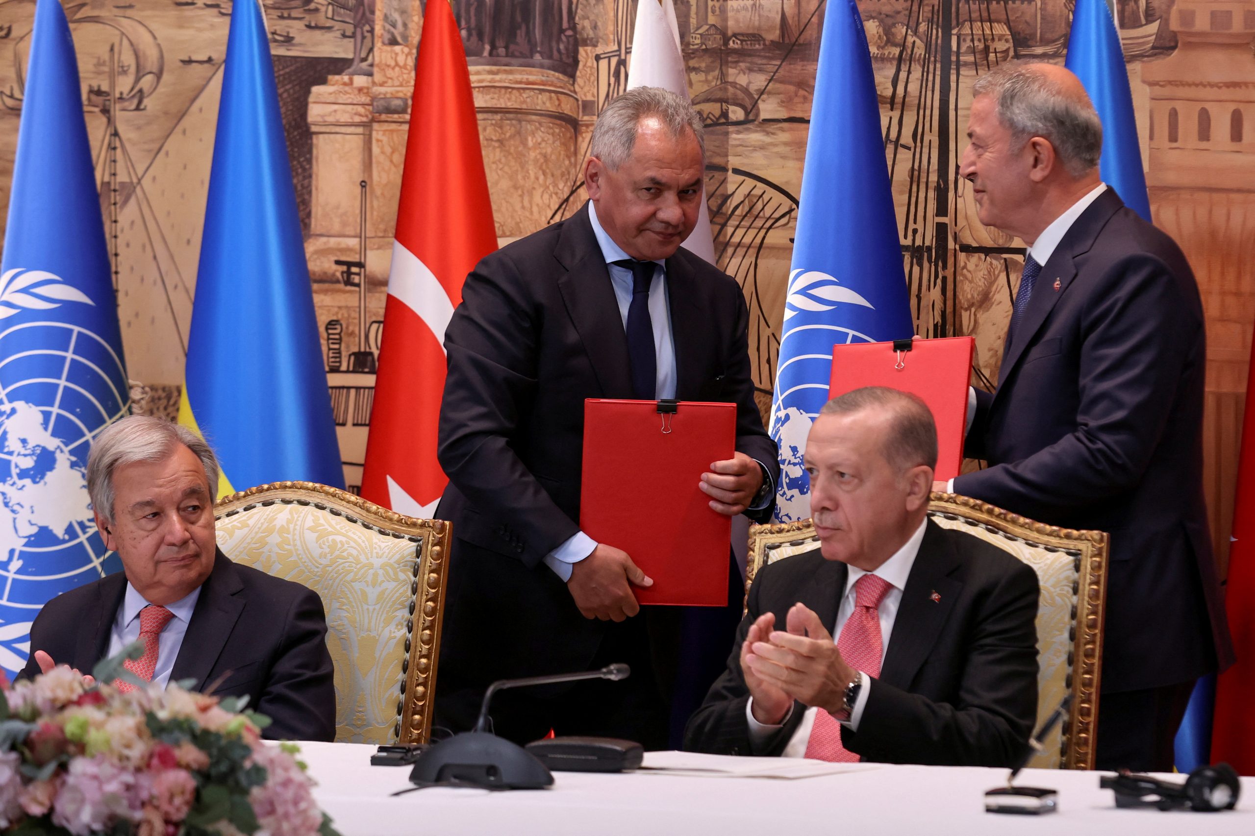 U.N. Secretary-General Antonio Guterres, Russia's Defence Minister Sergei Shoigu and Turkish President Recep Tayyip Erdogan attend a signing ceremony in Istanbul, Turkey July 22, 2022. REUTERS/Umit Bektas