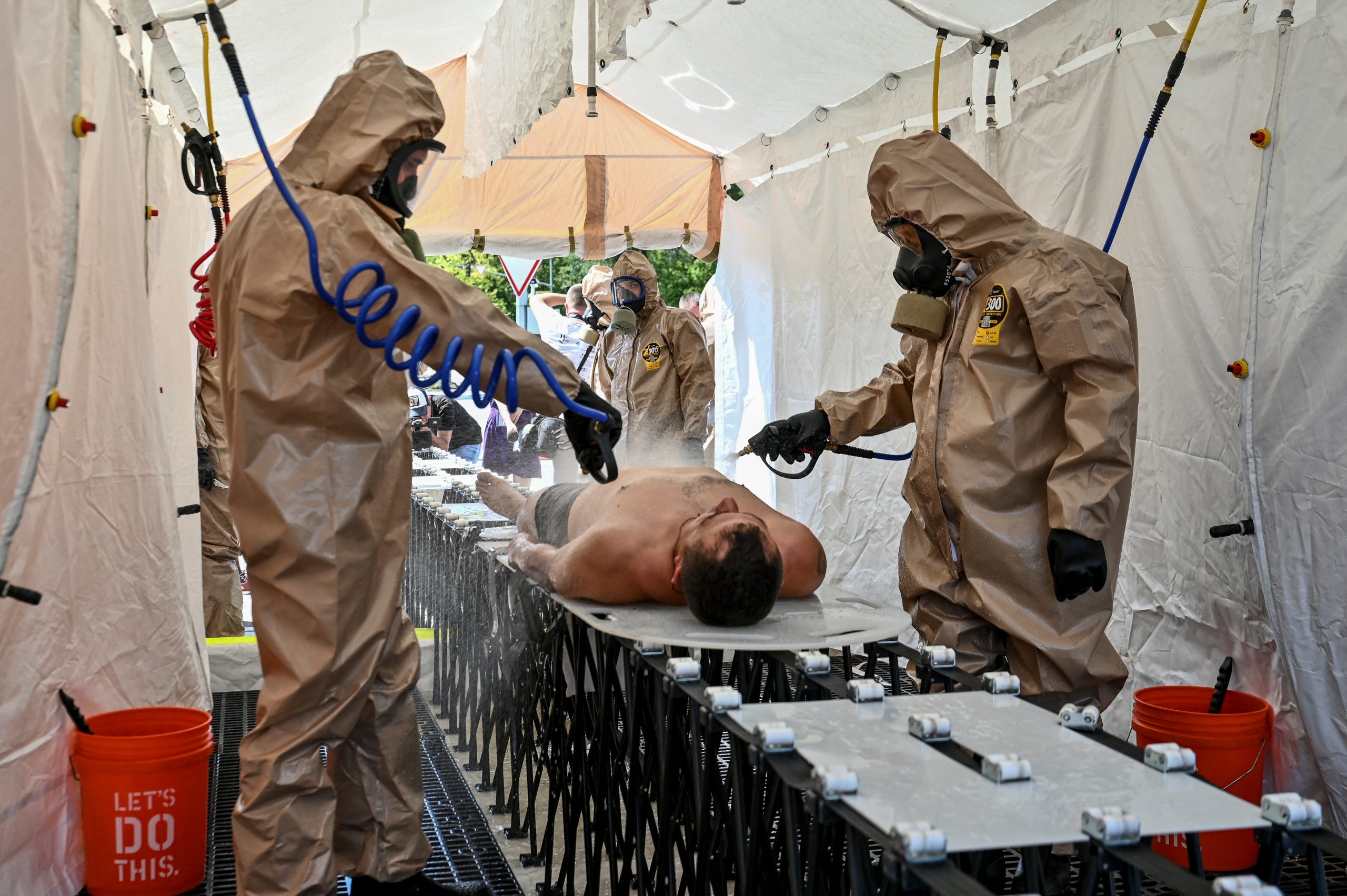 Members of the State Emergency Service attend nuclear disaster response drills amid shelling of Zaporizhzhia Nuclear Power Plant, as Russia's attack on Ukraine continues, in Zaporizhzhia, Ukraine August 17, 2022.  REUTERS/Dmytro Smolienko