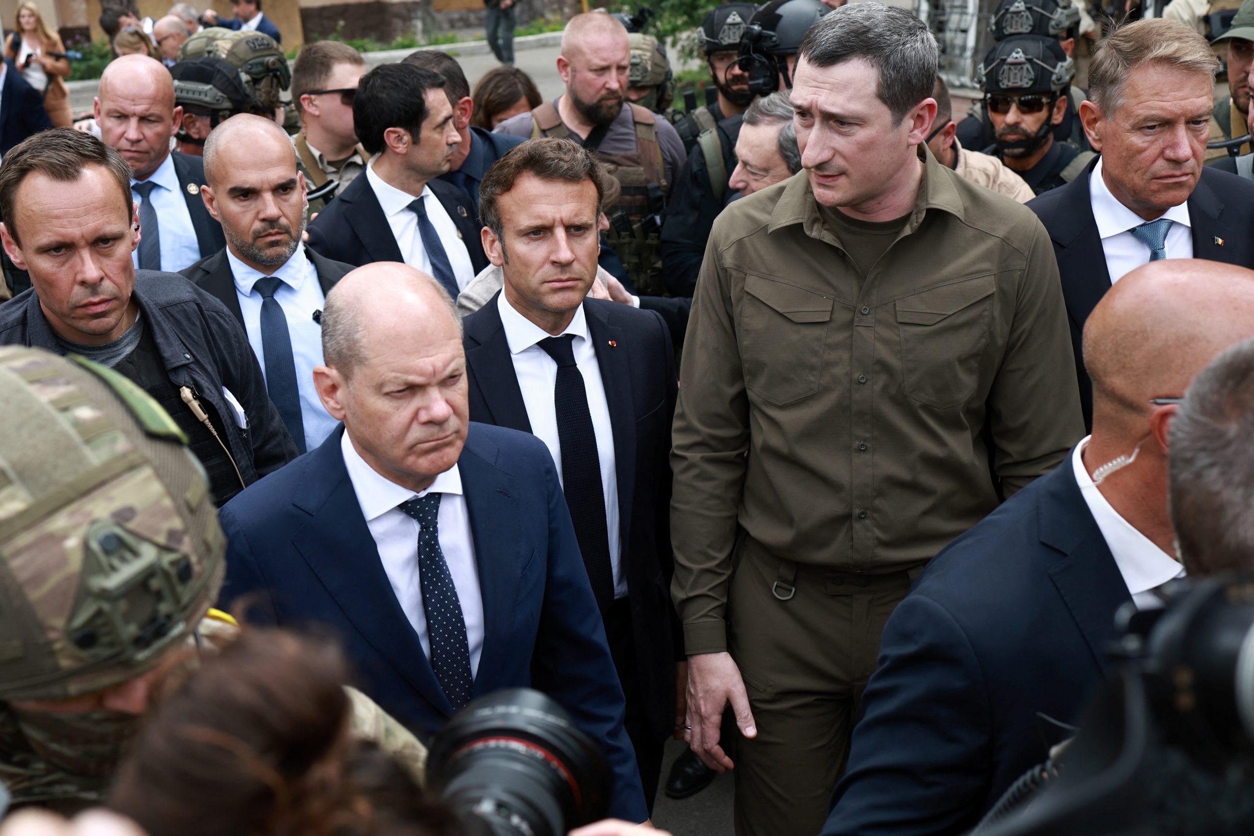 French President Emmanuel Macron, German Chancellor Olaf Scholz, Italian Prime Minister Mario Draghi and Romanian President Klaus Iohannis visit Irpin, as Russia's attack on Ukraine continues, near Kyiv, Ukraine June 16, 2022. REUTERS/Marko Djurica
