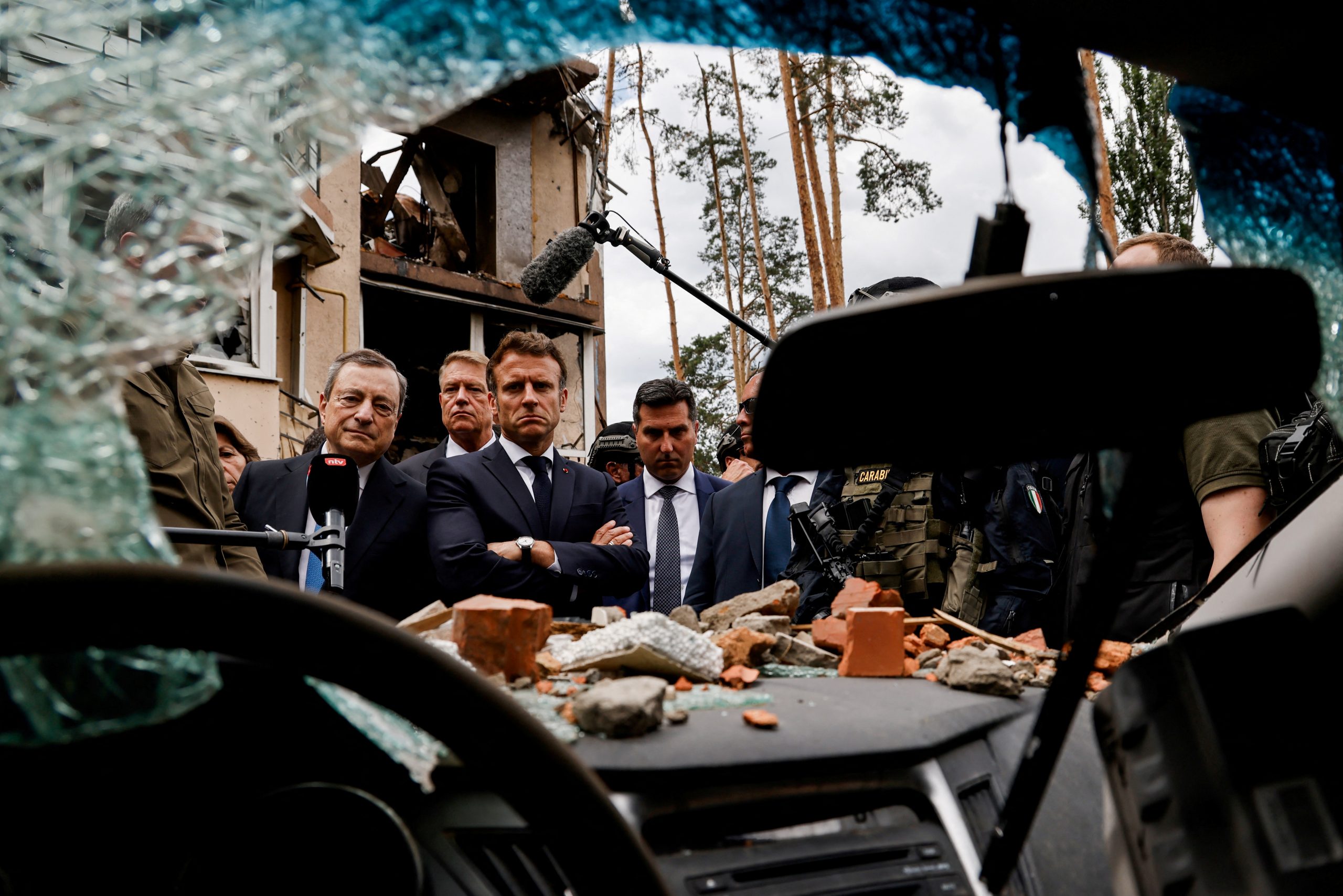 France's President Emmanuel Macron, Italian Prime Minister Mario Draghi and Romanian President Klaus Iohannis visit Irpin, Ukraine June 16, 2022. Ludovic Marin/Pool via REUTERS
