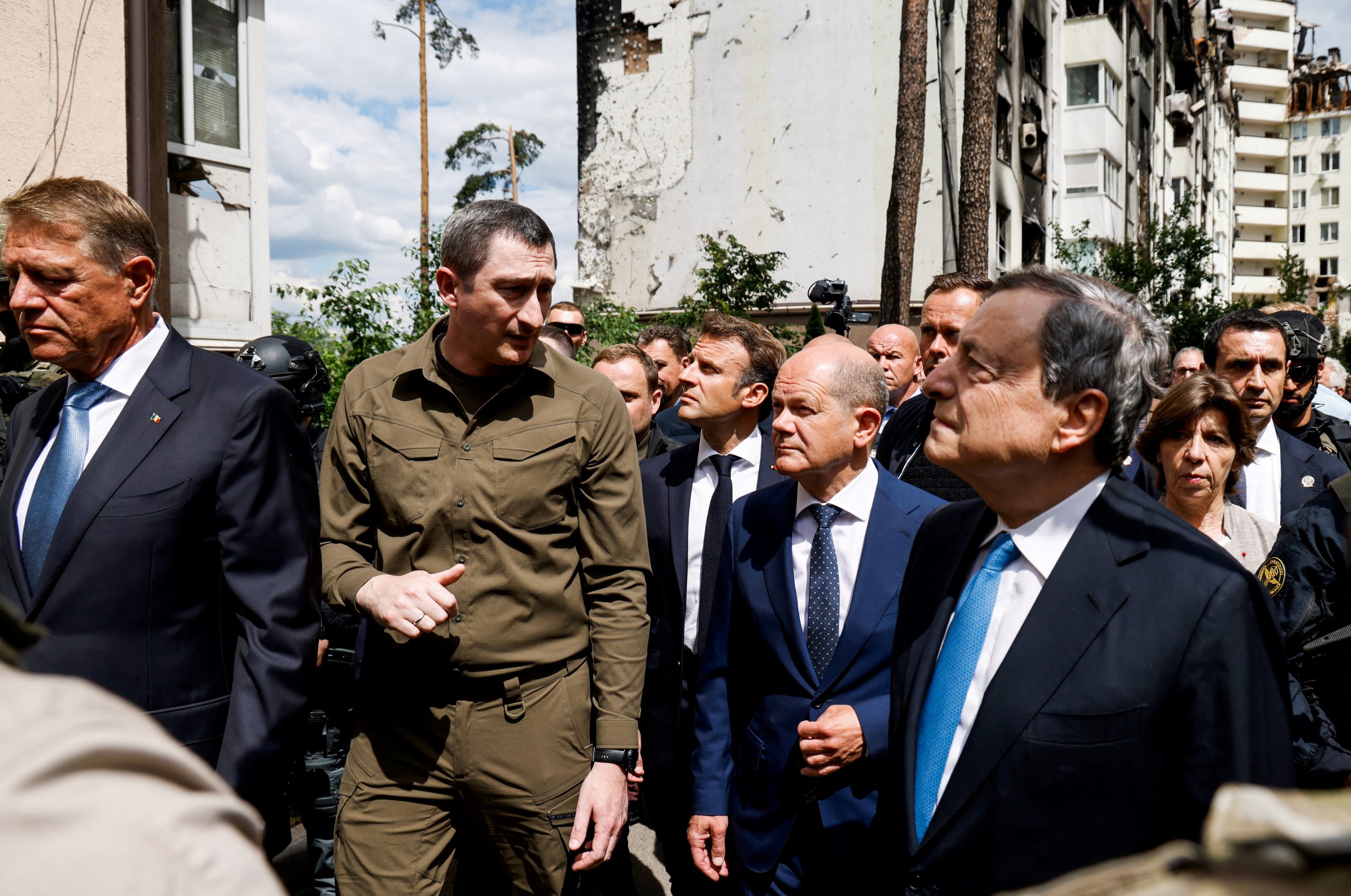 Romanian President Klaus Iohannis French President Emmanuel Macron, German Chancellor Olaf Scholz and Italian Prime Minister Mario Draghi visit Irpin, Ukraine, June 16, 2022. Ludovic Marin/Pool via REUTERS