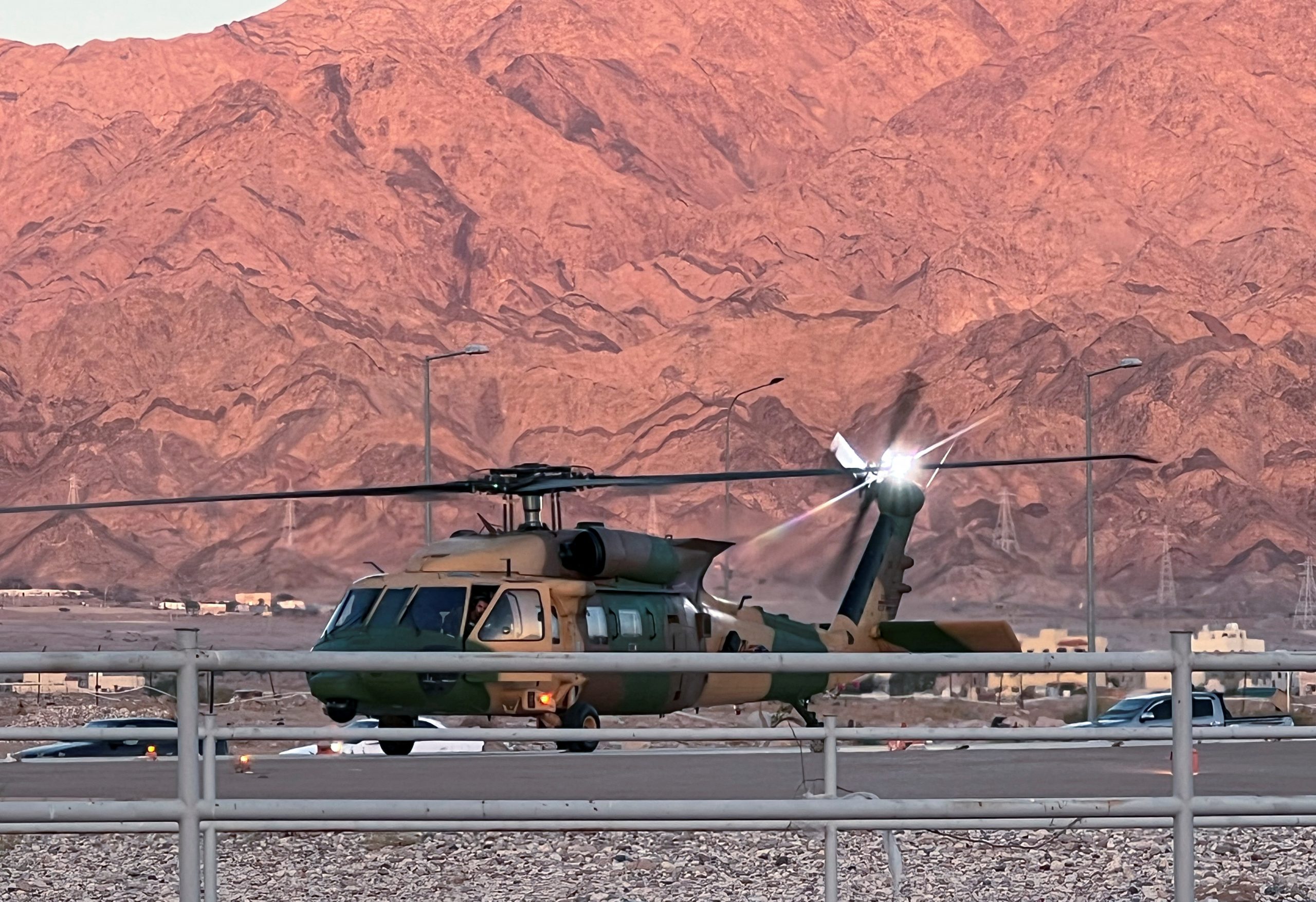 A military helicopter is pictured near a hospital after toxic gas leak from a storage tank in Jordan's Aqaba port, Jordan June 27, 2022. REUTERS/Abraham Farajian   NO RESALES. NO ARCHIVES