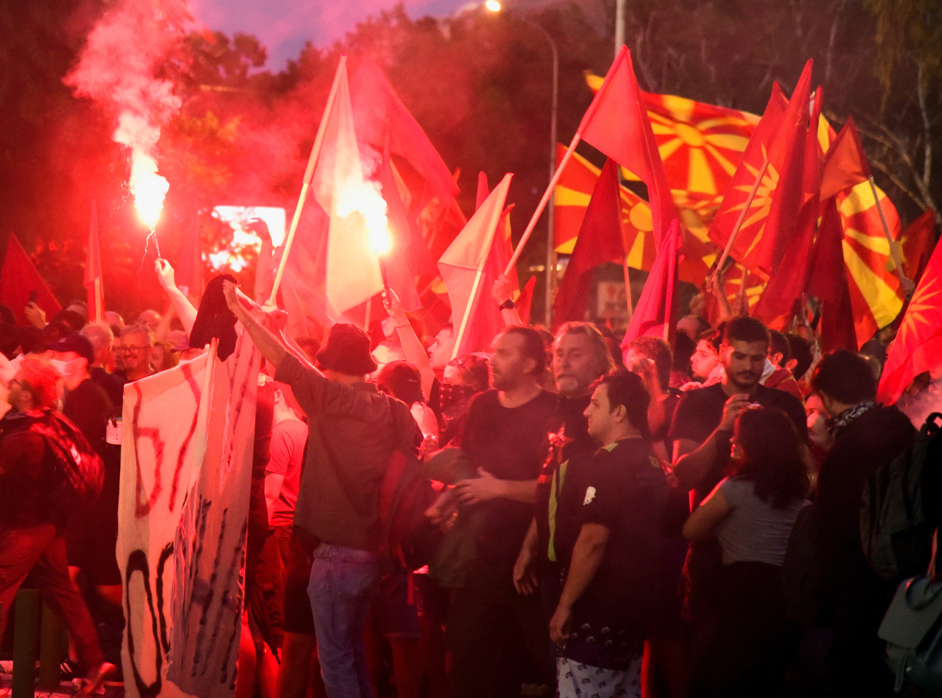 Supporters of North Macedonia's biggest opposition party VMRO-DPMNE, wave flags and shout slogans during a rally demanding the rejection of the French proposal, in Skopje, North Macedonia July 5, 2022. REUTERS/Nake Batev NO RESALES. NO ARCHIVES
