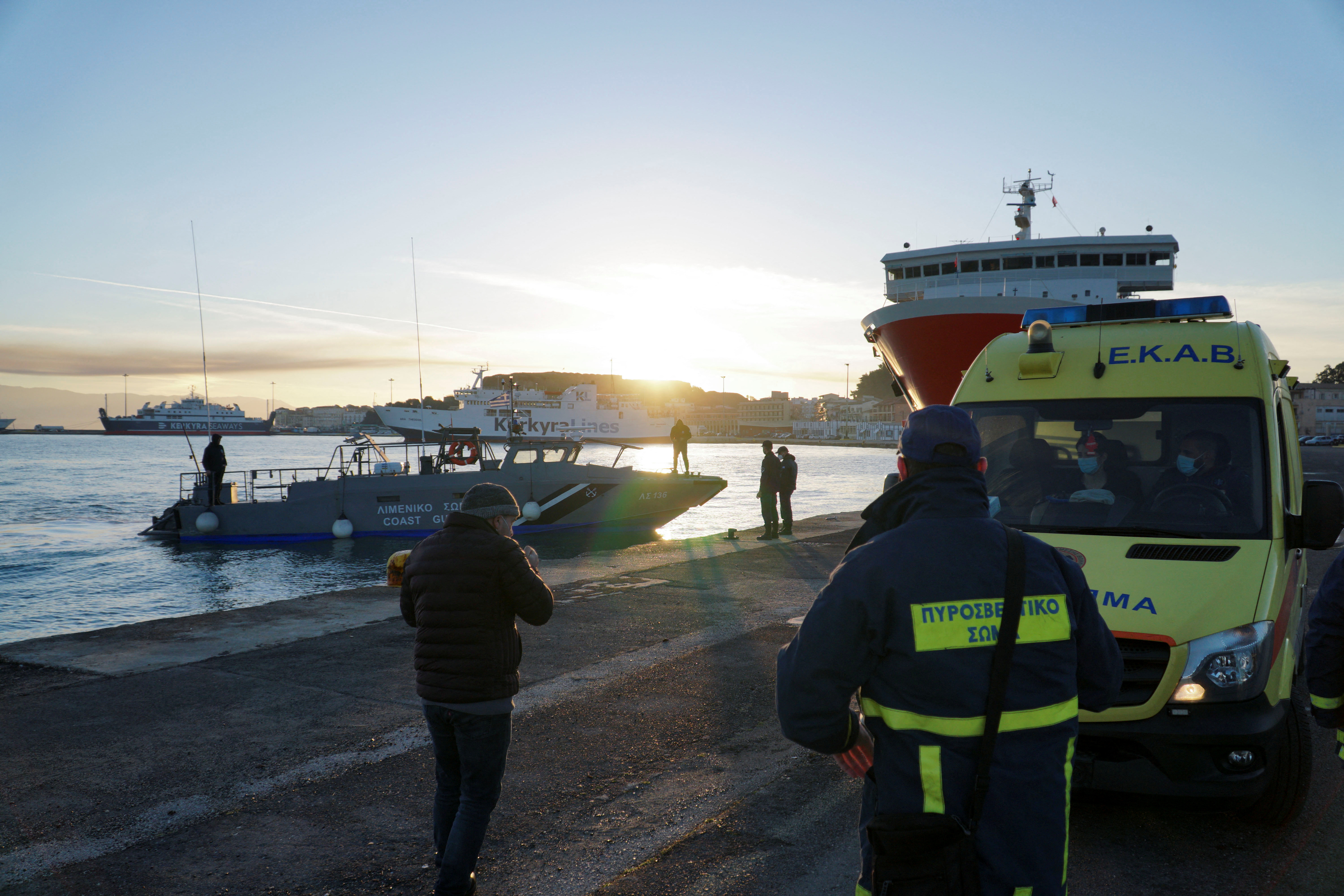 A Greek coast guard vessel carrying a passenger from Italian-flagged Euroferry Olympia that caught fire off the island of Corfu, approaches the port on Corfu, Greece, February 18, 2022. REUTERS/Adonis Skordilis