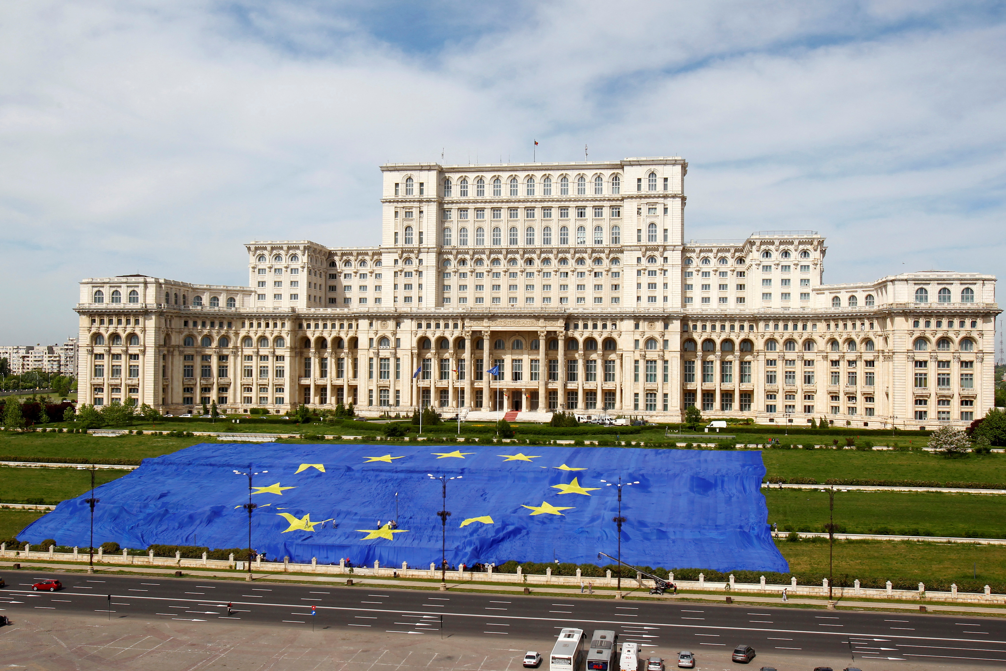 FILE PHOTO: A large European Union flag is displayed in front of Romania's Parliament Building to mark EU Day in Bucharest