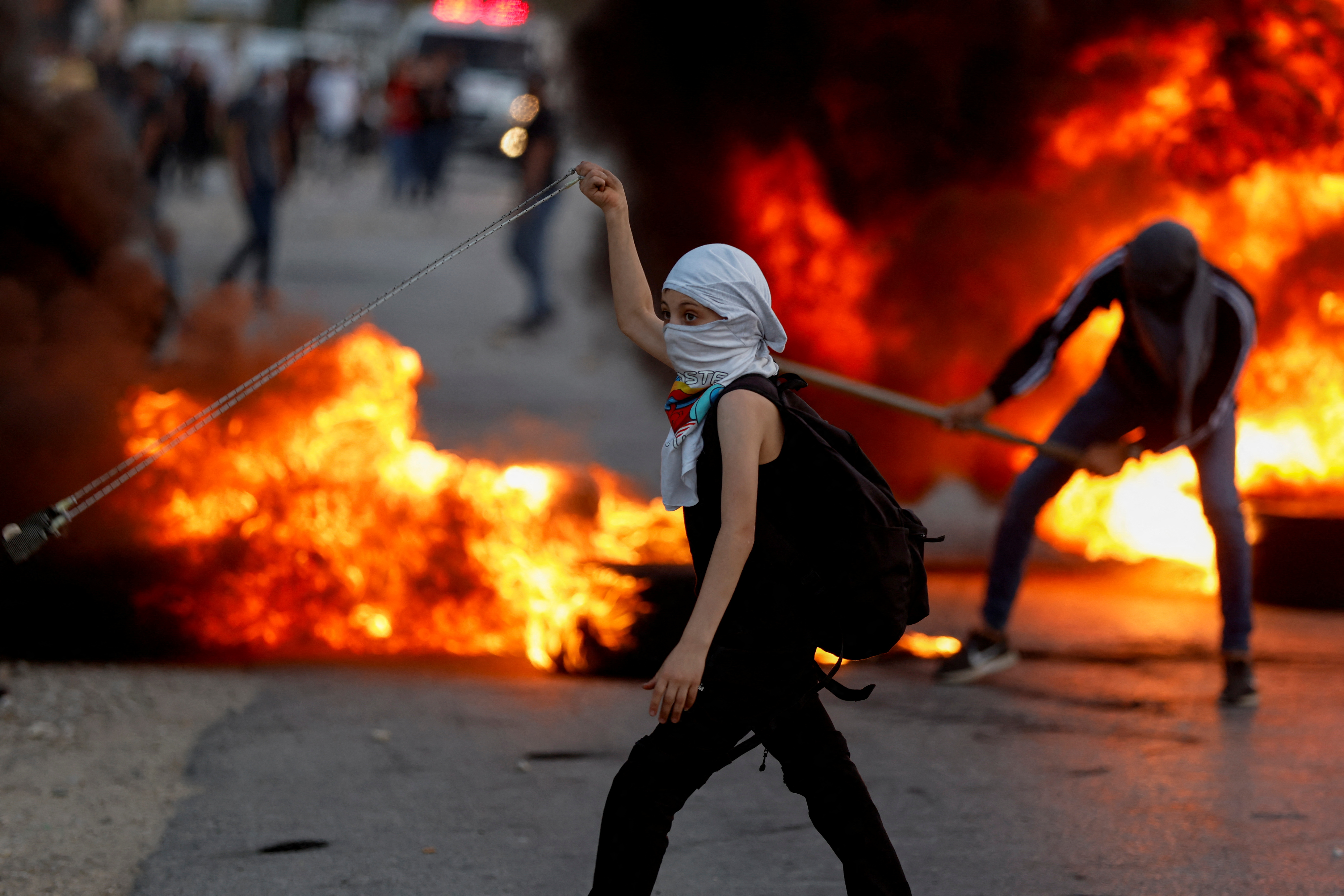 Palestinians protest over tensions in Jerusalem's Al-Aqsa Mosque, near Beit El