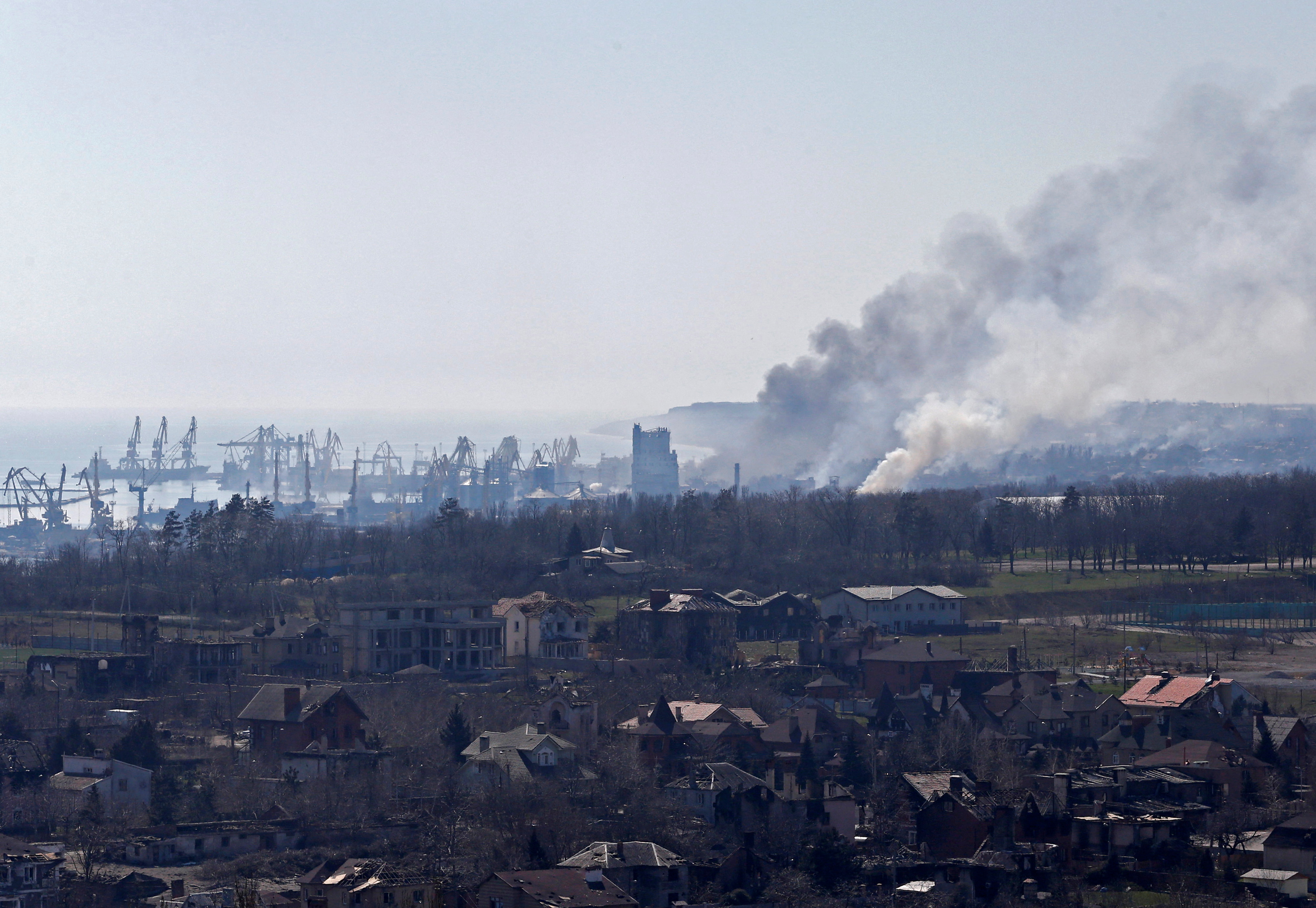 Smoke rises from the site of a fire during Ukraine-Russia conflict in the southern port city of Mariupol, Ukraine April 7, 2022. REUTERS/Alexander Ermochenko