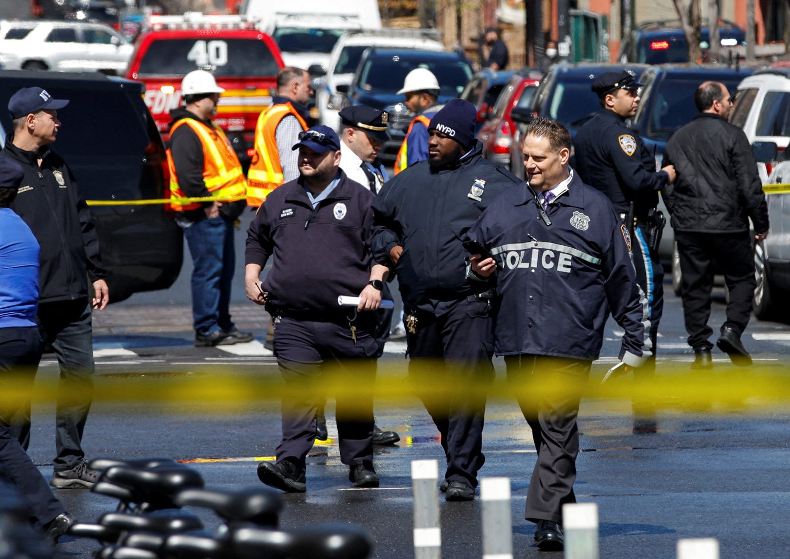 Emergency personnel work at the scene of a shooting at a subway station in the Brooklyn borough of New York City, New York, U.S., April 12, 2022. REUTERS/Eduardo Munoz