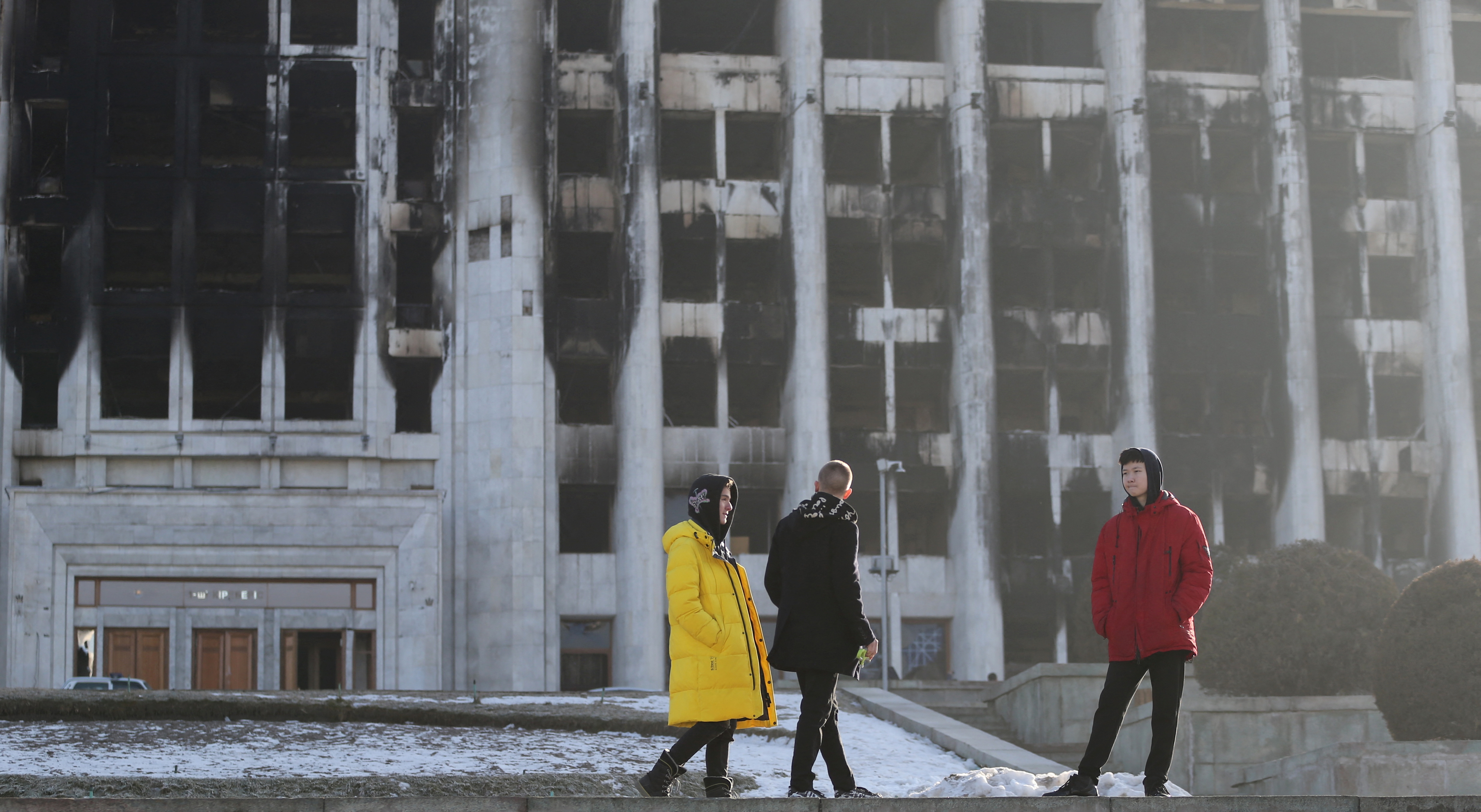 A view shows the burnt city administration headquarters in Almaty