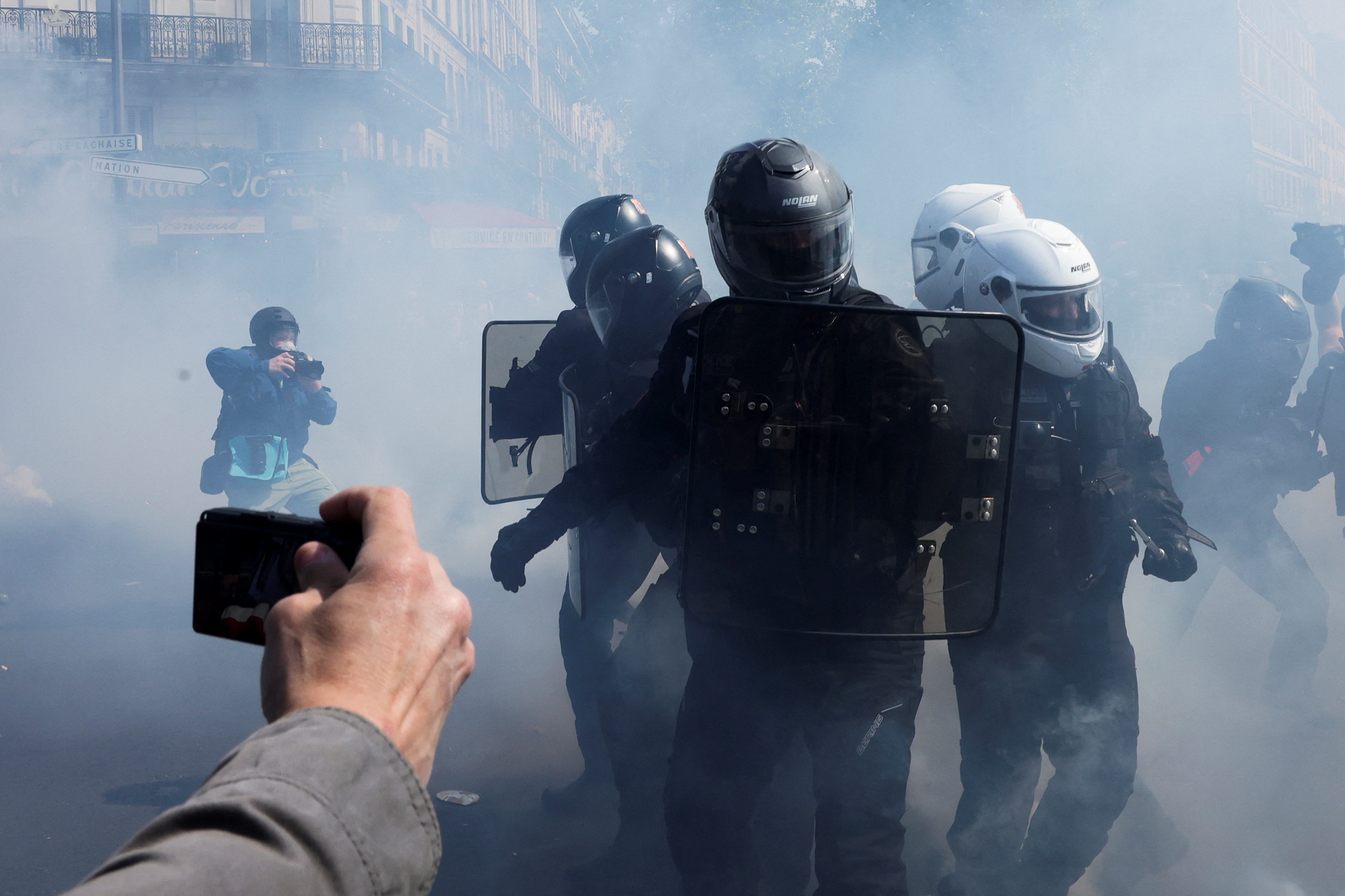 French CRS riot police charge during clashes as part of the traditional May Day labour union march in Paris, France, May 1, 2022. REUTERS/Sarah Meyssonnier