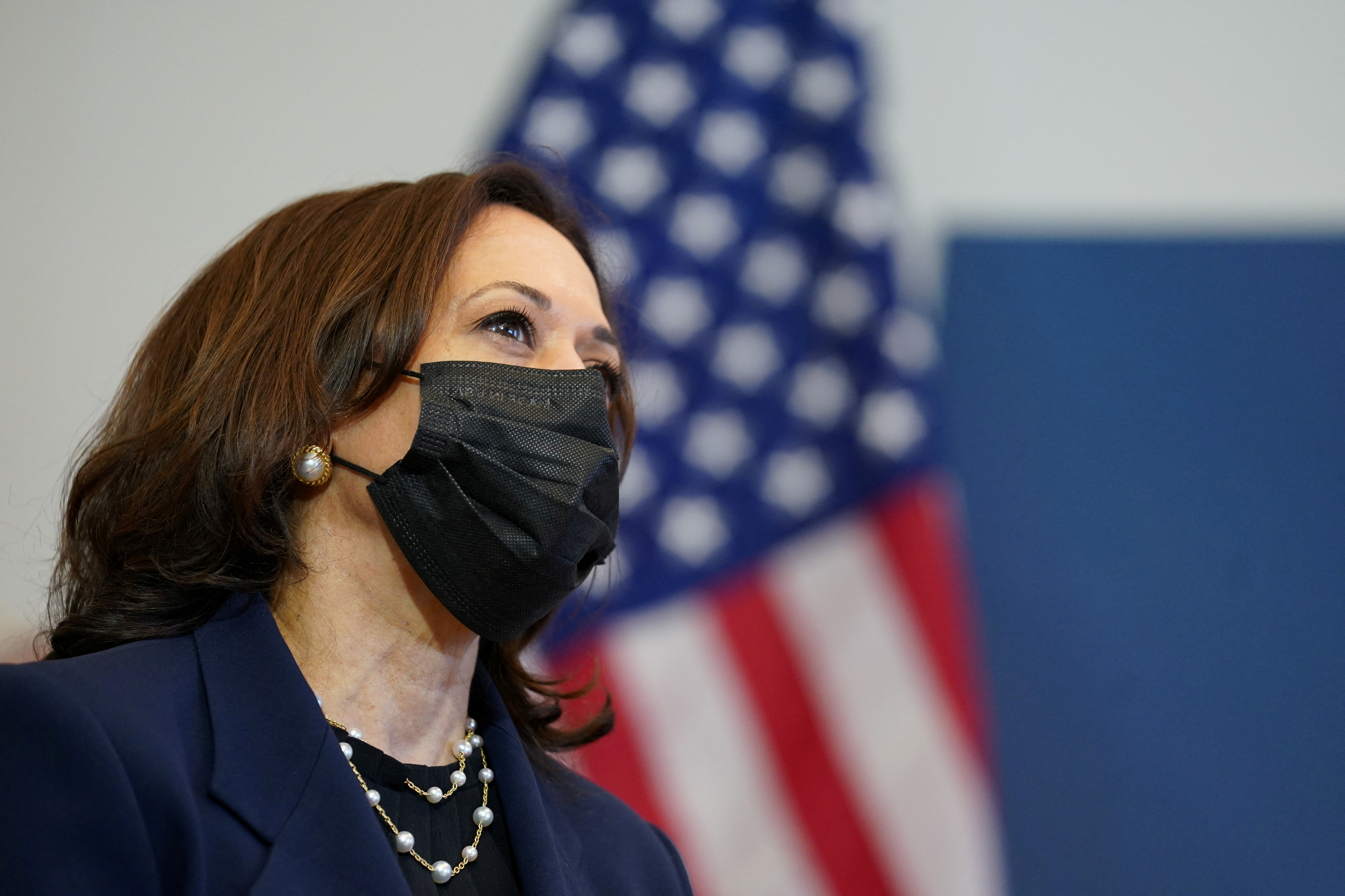 FILE PHOTO: U.S. Vice President Kamala Harris looks on as she attends a speed pitch with entrepreneurs who have a social impact focus, in Providence, Rhode Island, U.S., May 5, 2021. REUTERS/Kevin Lamarque/File Photo