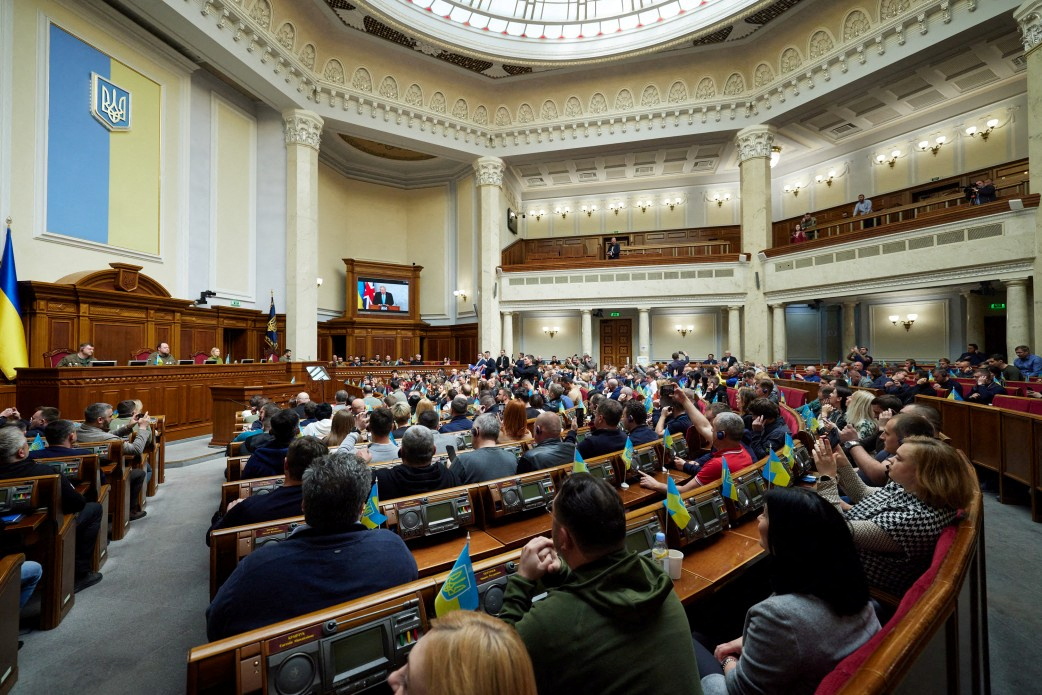 Ukraine's President Zelenskiy and British PM Johnson address a session of parliament, in Kyiv