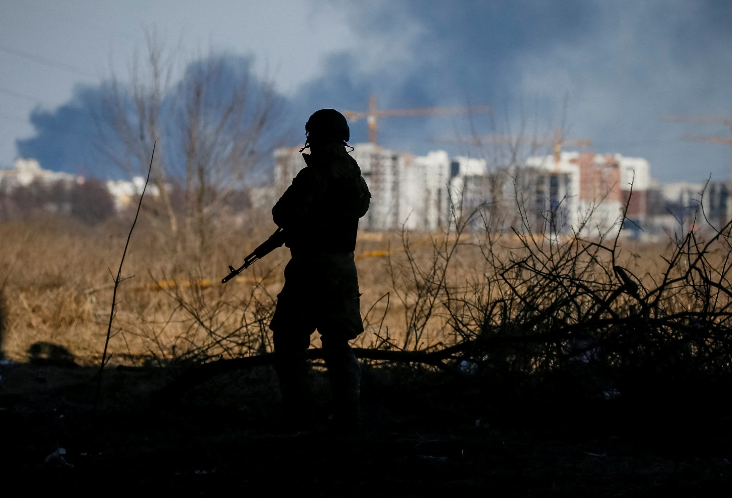 A member of the Ukrainian forces takes a position, amid Russia's invasion of Ukraine, in Irpin, Ukraine March 12, 2022. Picture taken March 12, 2022. REUTERS/Gleb Garanich