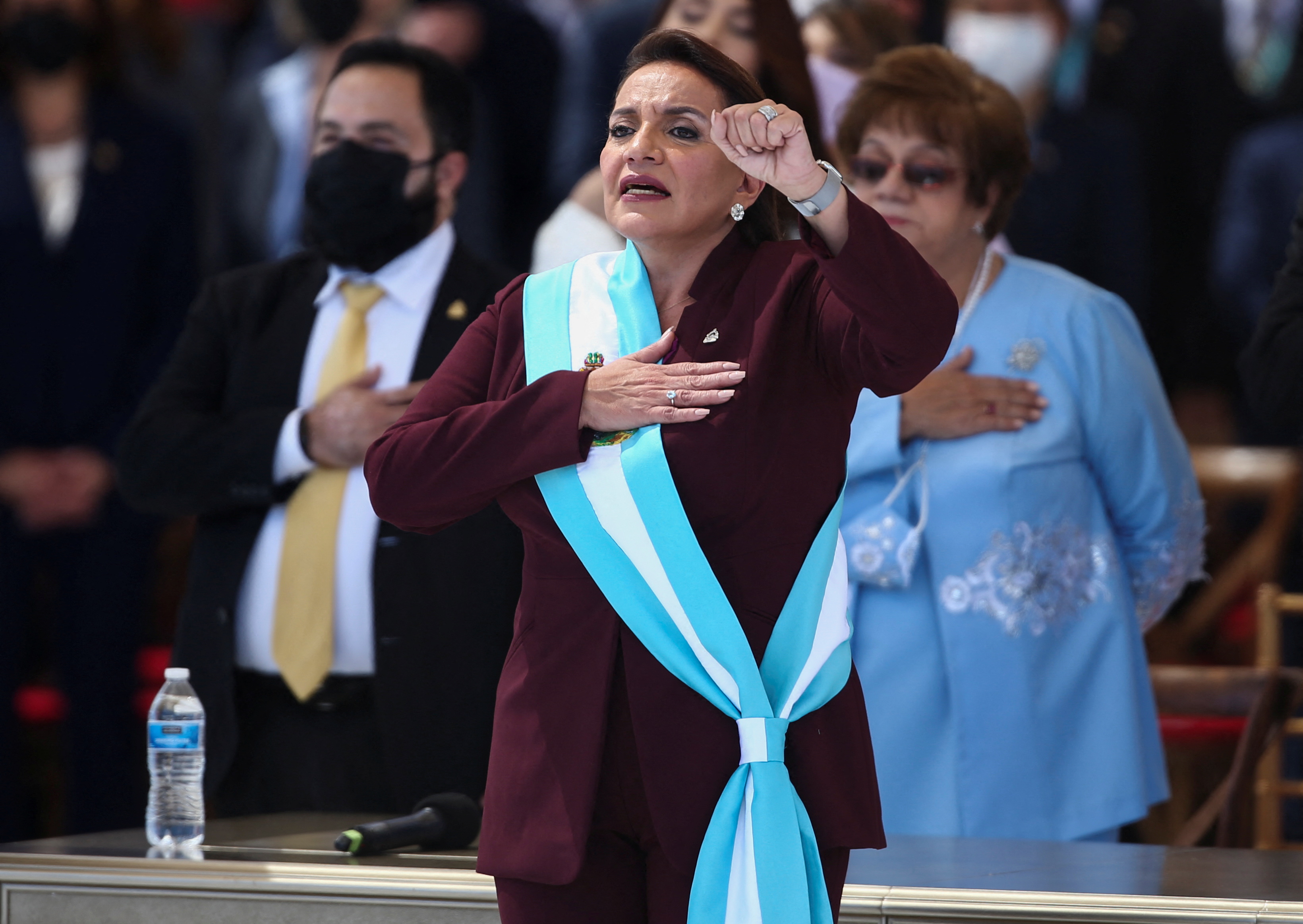 New Honduran President Xiomara Castro reacts after receiving the presidential sash during a swearing-in ceremony in Tegucigalpa, Honduras January 27, 2022. REUTERS/Jose Cabezas