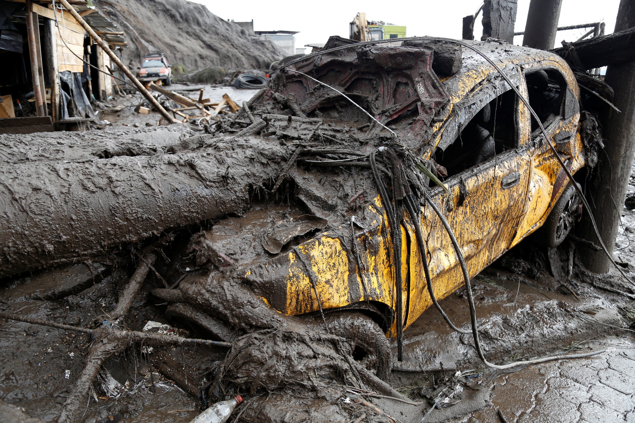 A car is seen in an area of a landslide ​in Quito, Ecuador, February 1, 2022. REUTERS/Jonatan Rosas  NO RESALES. NO ARCHIVES.