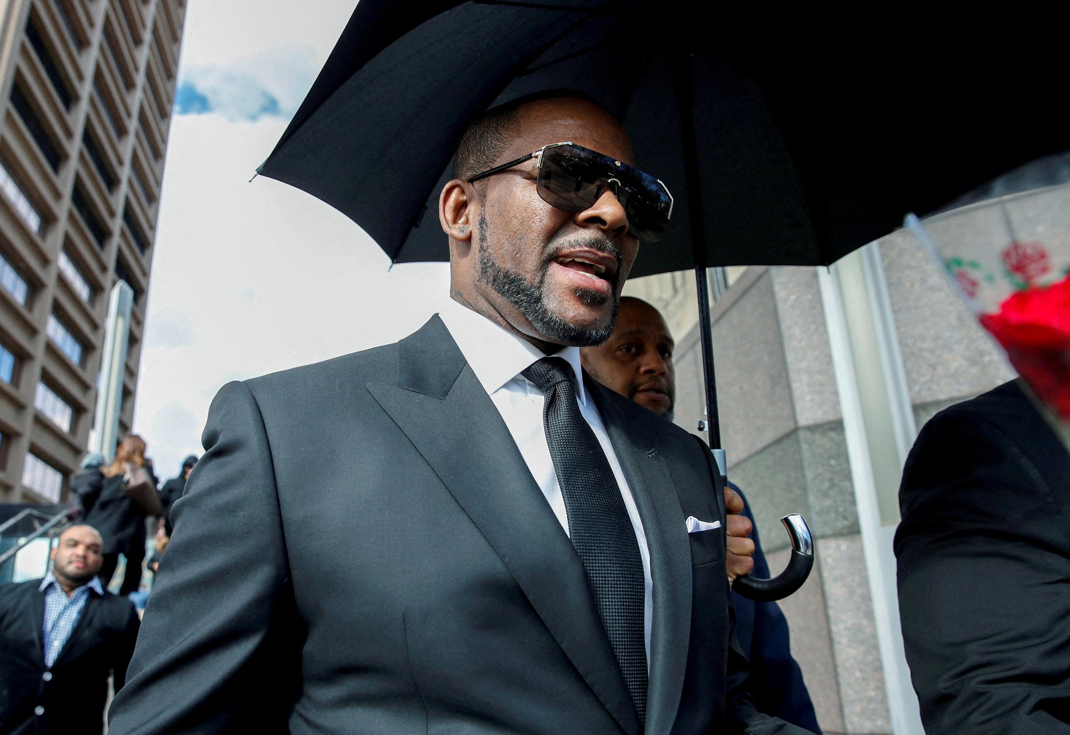 FILE PHOTO: Grammy-winning R&amp;B star R. Kelly leaves the Cook County courthouse in Chicago