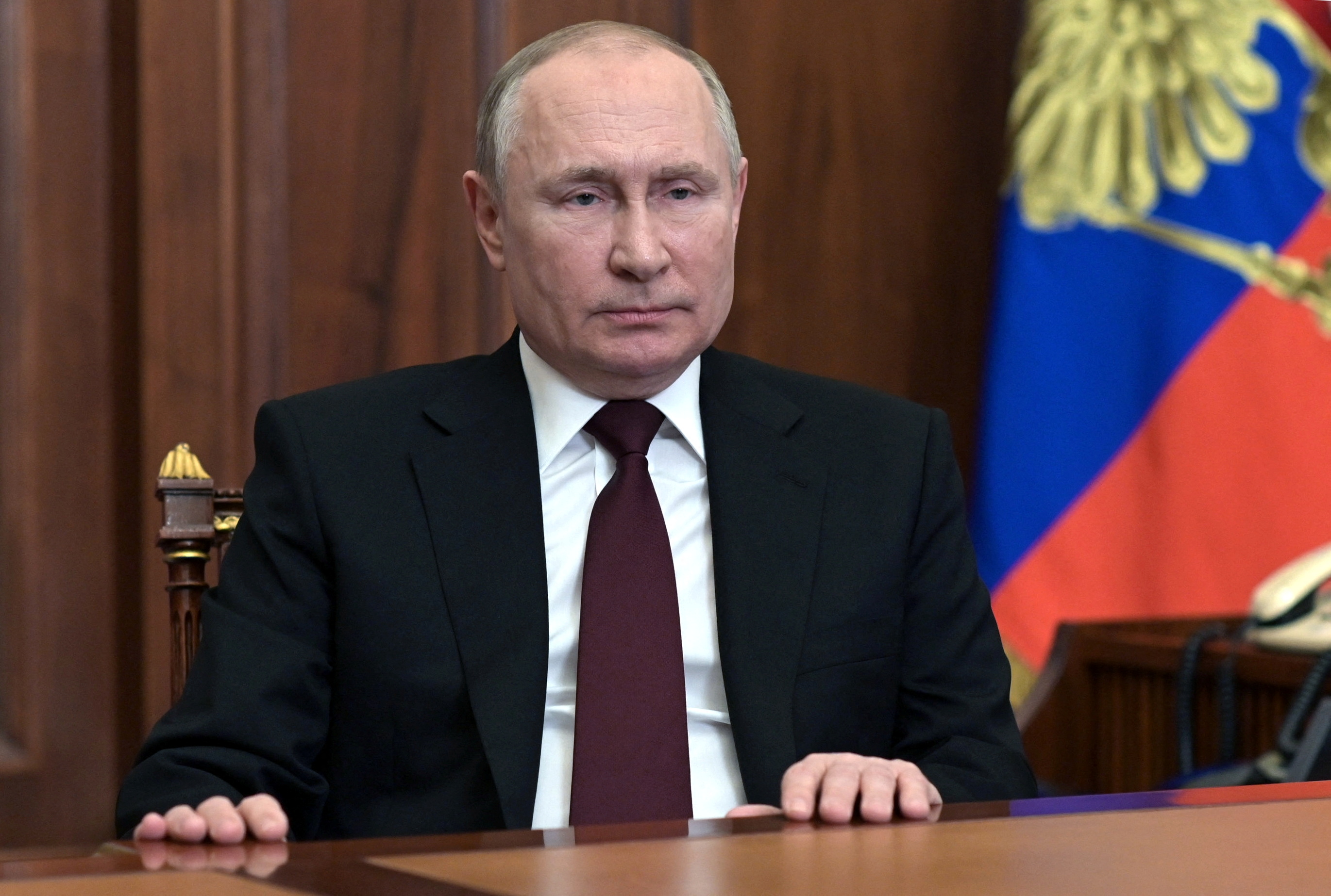 Russian President Vladimir Putin delivers a video address to the nation in Moscow