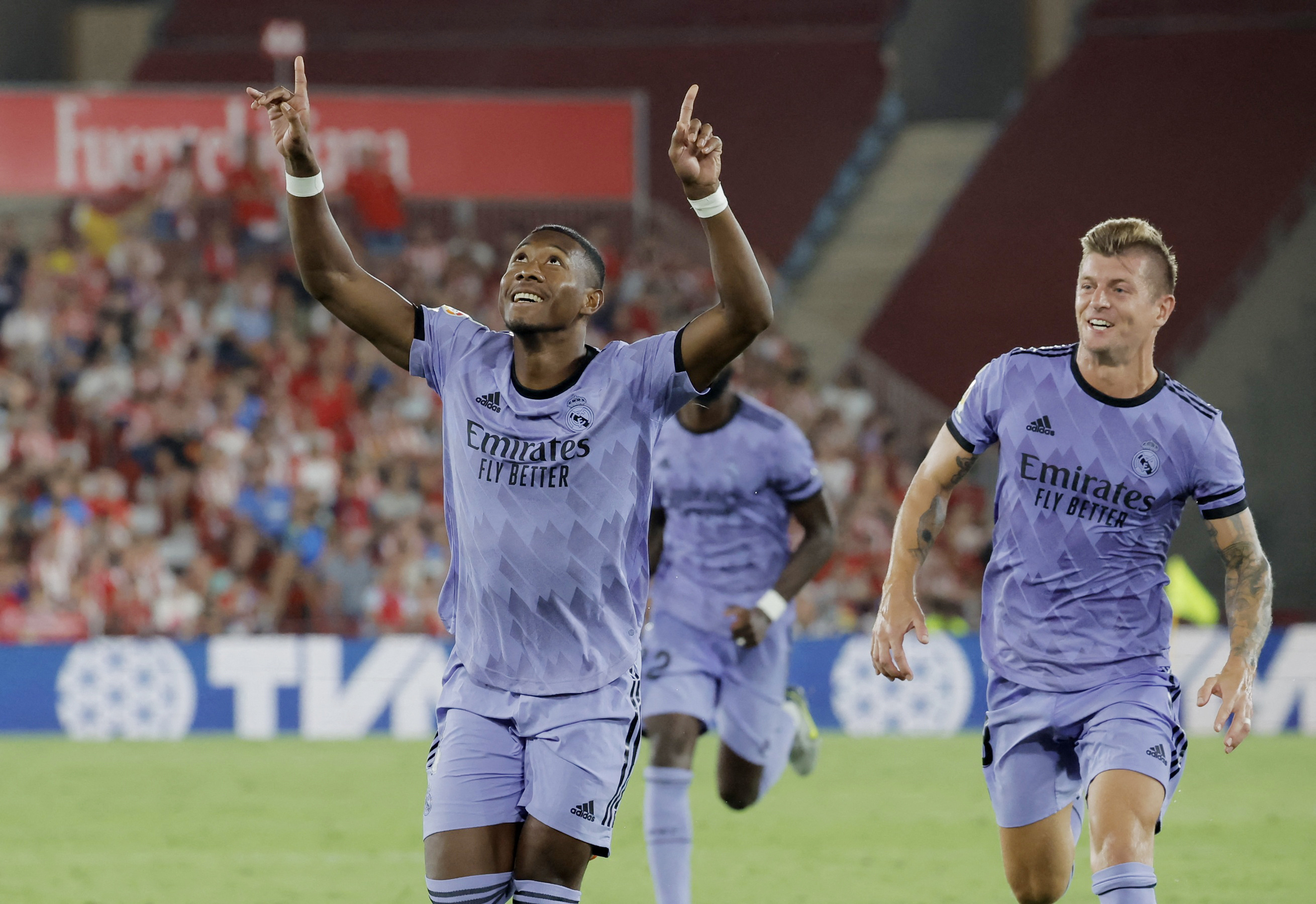 Soccer Football - LaLiga - Almeria v Real Madrid - Estadio de los Juegos Mediterraneos, Almeria, Spain - August 14, 2022 Real Madrid's David Alaba celebrates scoring their second goal with teammates REUTERS/Jon Nazca