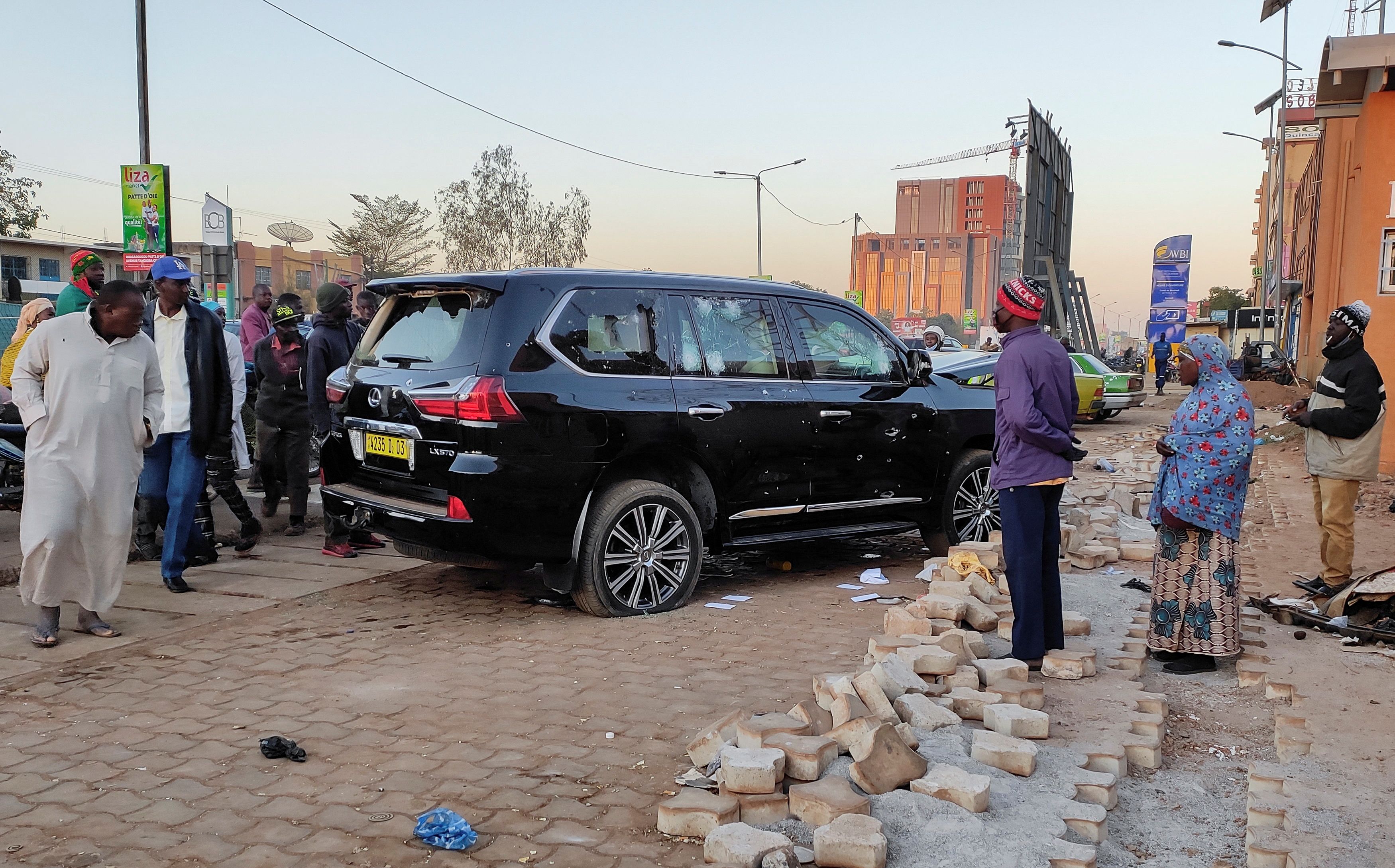 Bullet holes are seen in a car that belong to presidency  following heavy gunfire near the president Roch Kabore residence  in Ouagadougou, Burkina Faso January 24, 2022. REUTERS/Thiam Ndiaga  NO RESALES. NO ARCHIVES