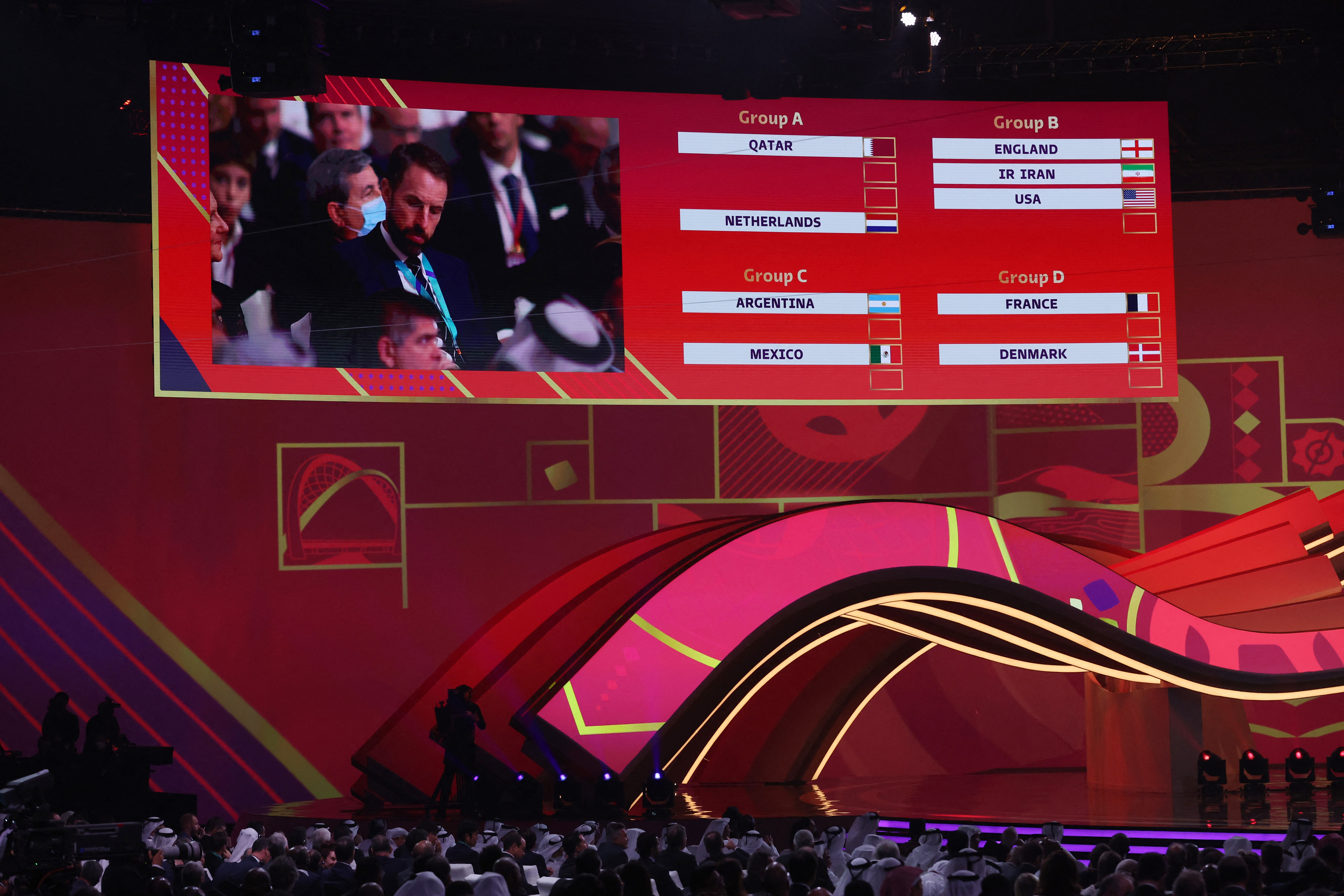Soccer Football - World Cup - Final Draw - Doha Exhibition &amp; Convention Center, Doha, Qatar - April 1, 2022 England manager Gareth Southgate is seen on the screen during the draw REUTERS/Carl Recine