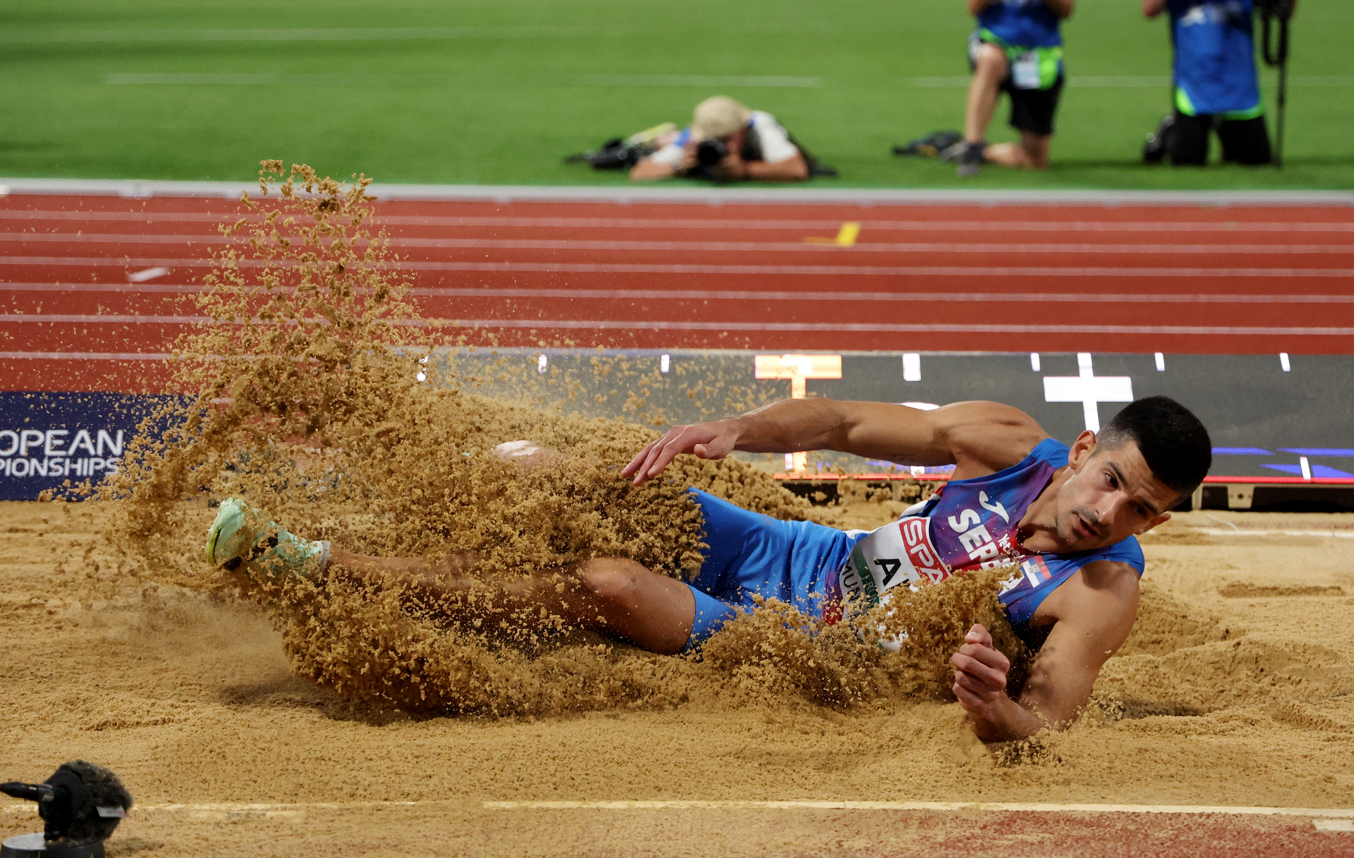 Athletics - 2022 European Championships - Olympiastadion, Munich, Germany - August 16, 2022 Serbia's Lazar Anic in action during the men's long jump final REUTERS/Lukas Barth