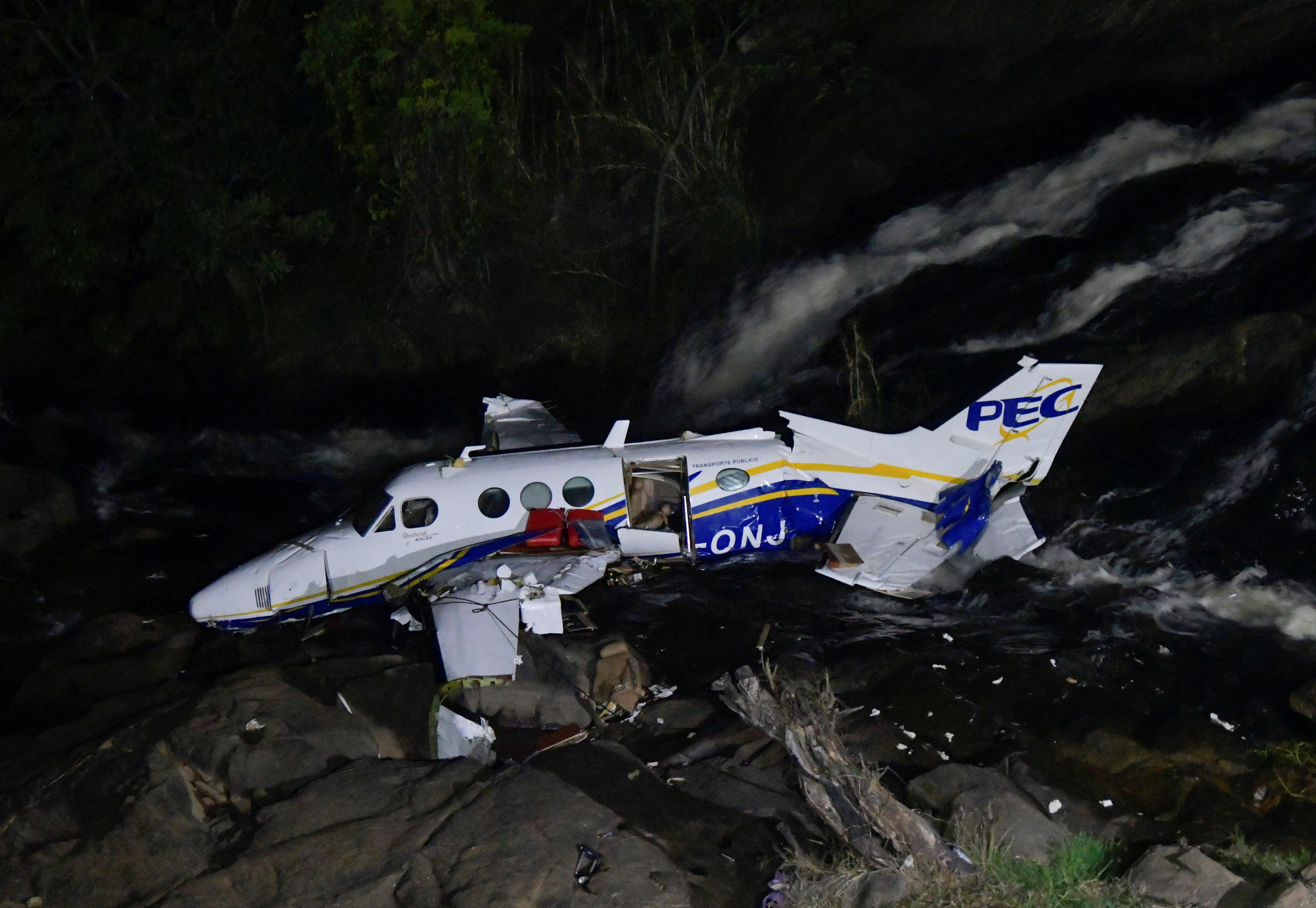 The wreckage of a small airplane that crashed with Brazilian country singer Marilia Mendonca, 26, is seen near a waterfall area in Piedade de Caratinga, state of Minas Gerais, Brazil, November 5, 2021. REUTERS/Washington Alves     TPX IMAGES OF THE DAY