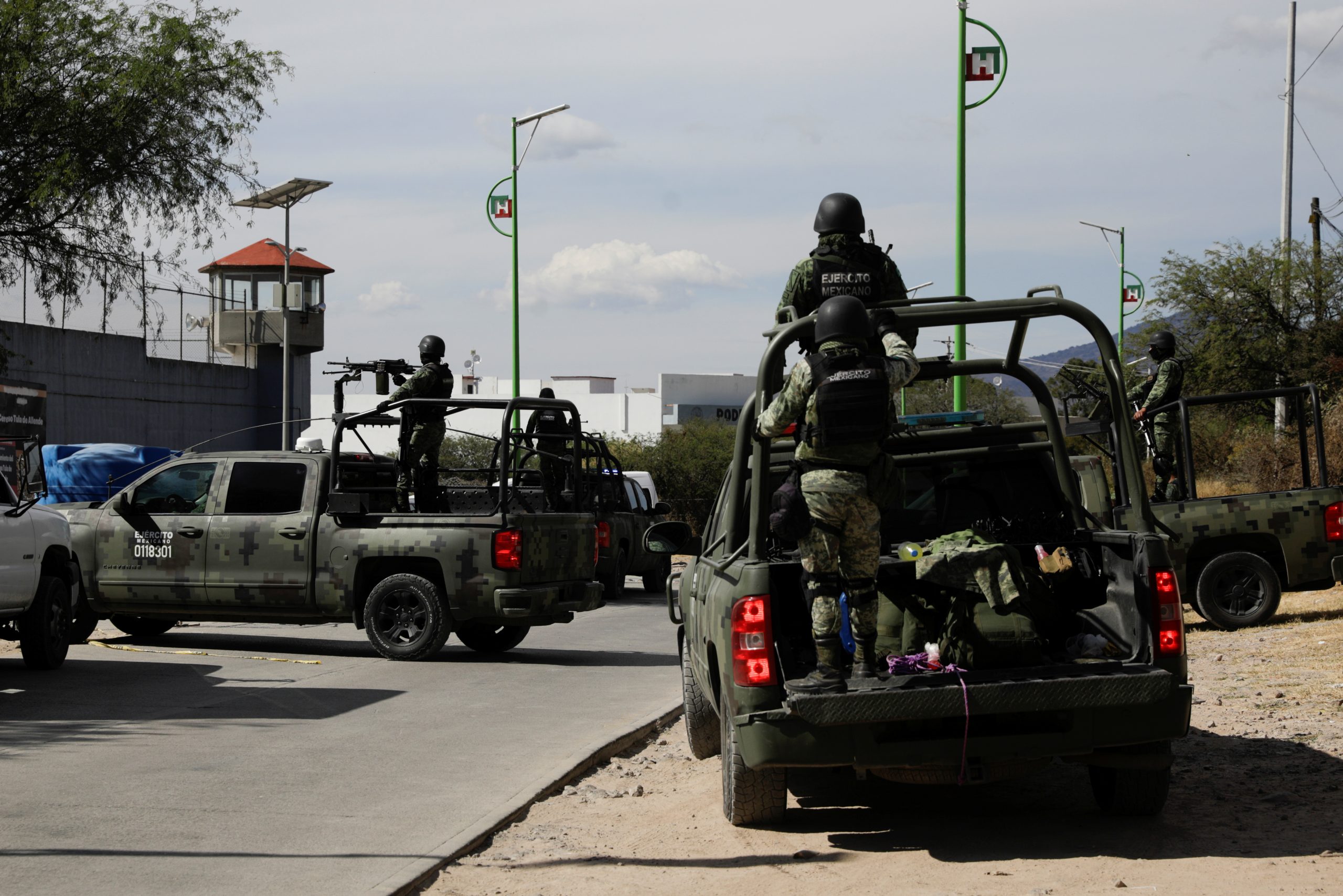 Mexican Army soldiers patrol outside the Tula prison after an alleged criminal group stormed into it to free nine inmates, according to a local government statement, in Tula, Hidalgo State, Mexico December 1, 2021. REUTERS/Luis Cortes