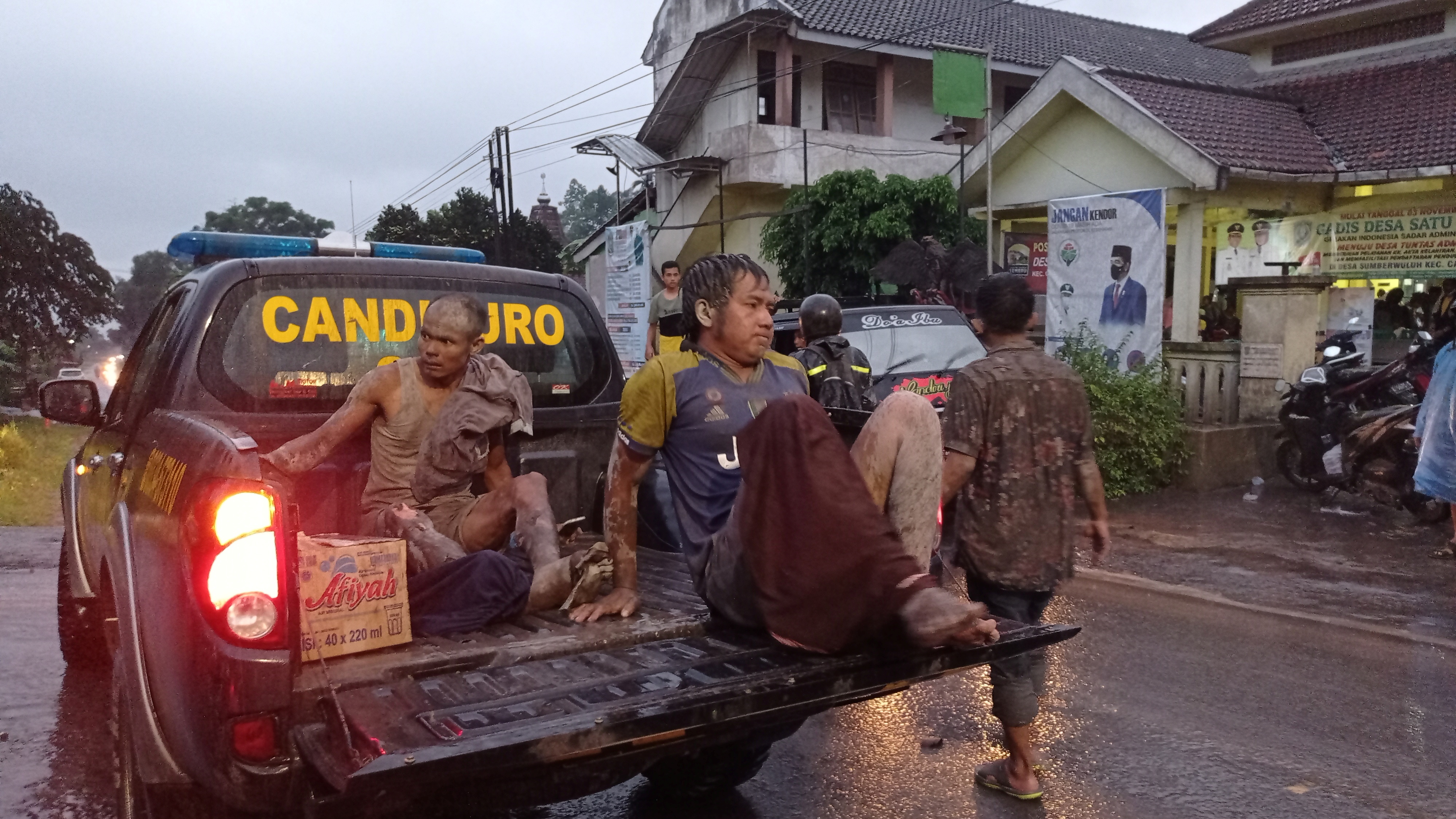 Local people affected by the eruption of Semeru mount volcano are evacuated at Sumberwuluh village in Lumajang regency, East Java province