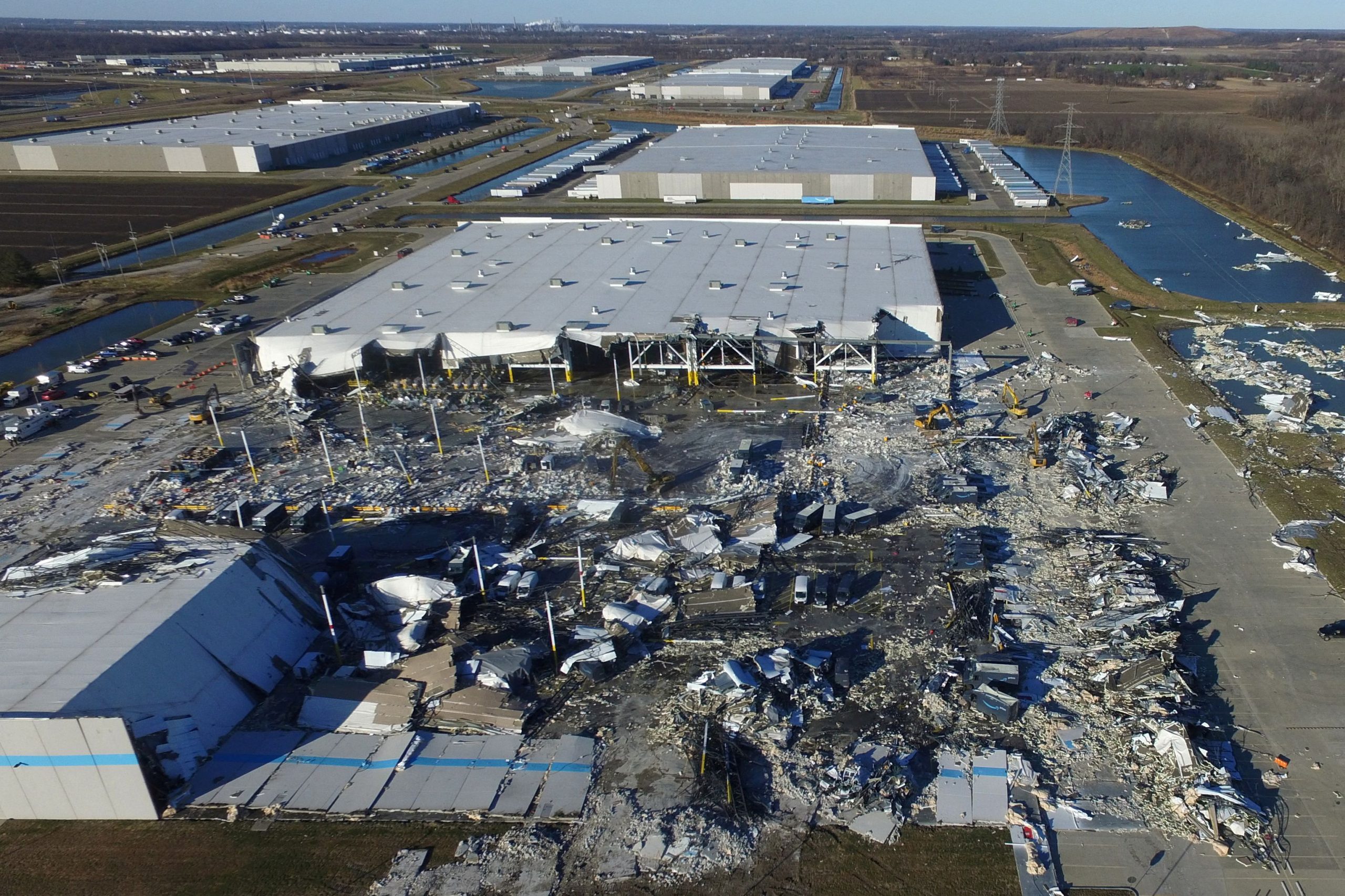 The site of a roof collapse at an Amazon.com distribution centre a day after a series of tornadoes dealt a blow to several U.S. states, in Edwardsville, Illinois, U.S. December 11, 2021.  REUTERS/Drone Base     TPX IMAGES OF THE DAY