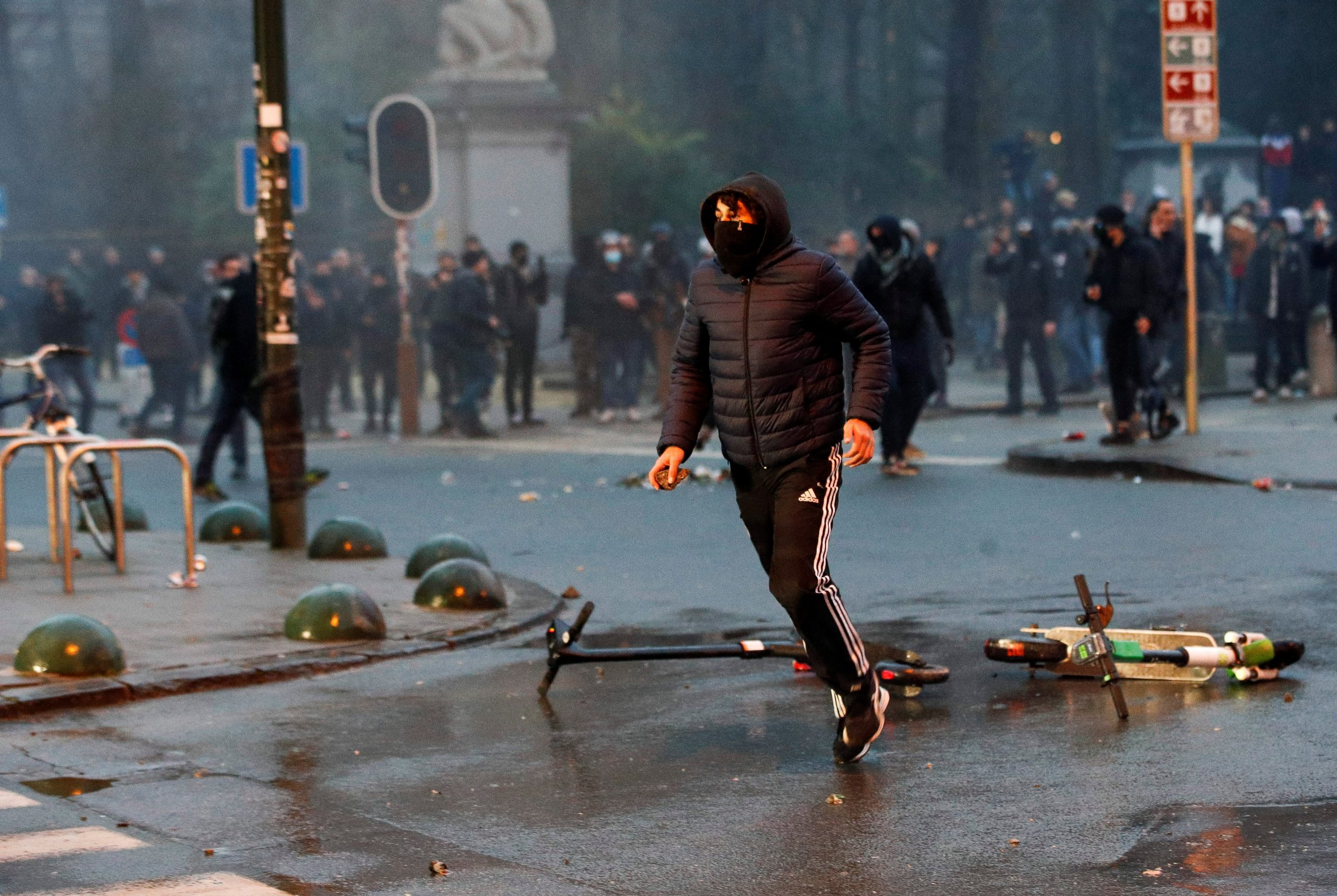 A person takes part in a demonstration against the Belgian government's restrictions imposed to contain the spread of the coronavirus disease (COVID-19) in Brussels, Belgium, December 19, 2021. REUTERS/Johanna Geron