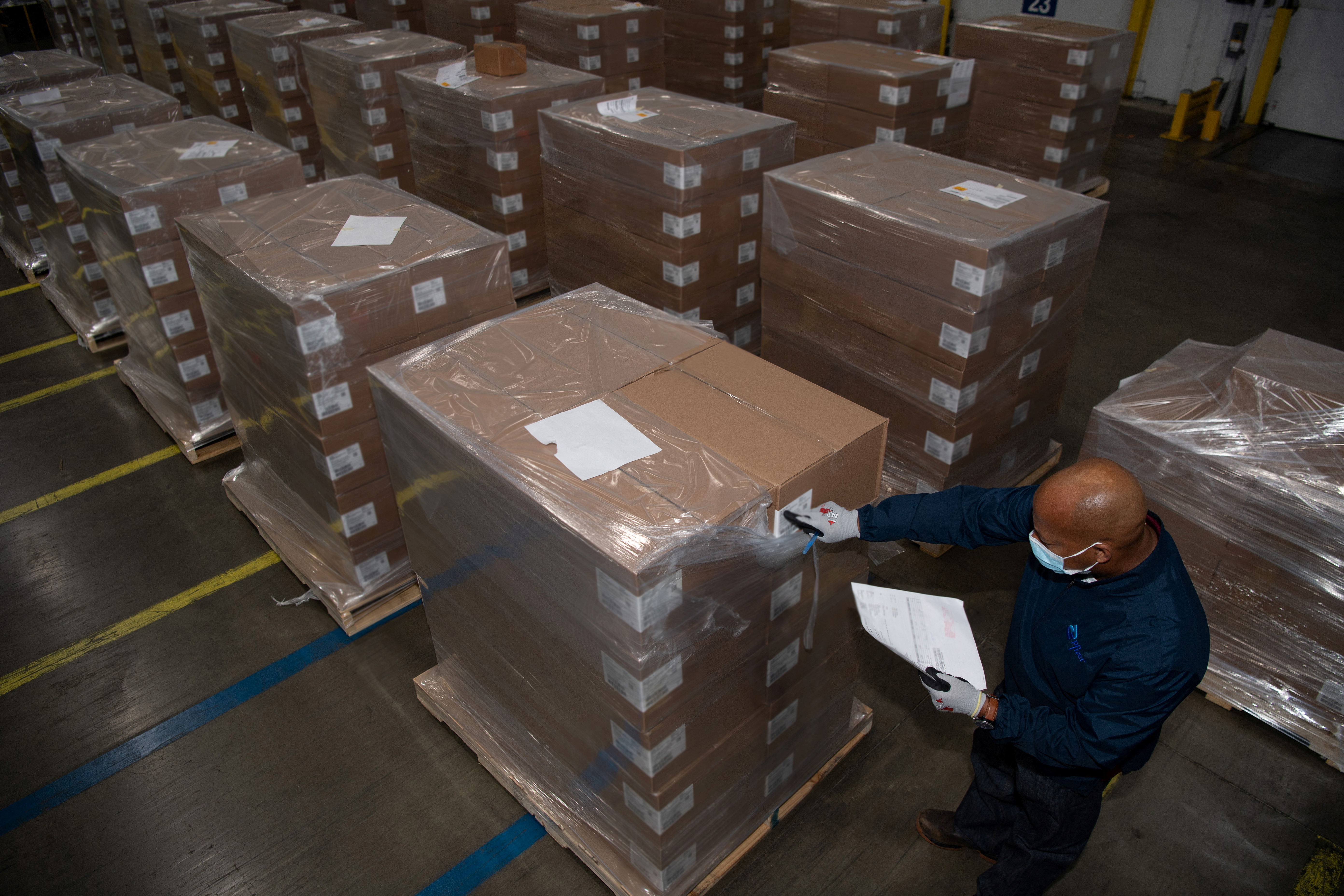 A Pfizer employee checks the boxes containing Paxlovid, COVID-19 treatment pills, at a distribution facility in Memphis, Tennessee, U.S. in this undated handout picture. Pfizer/Handout via REUTERS    THIS IMAGE HAS BEEN SUPPLIED BY A THIRD PARTY