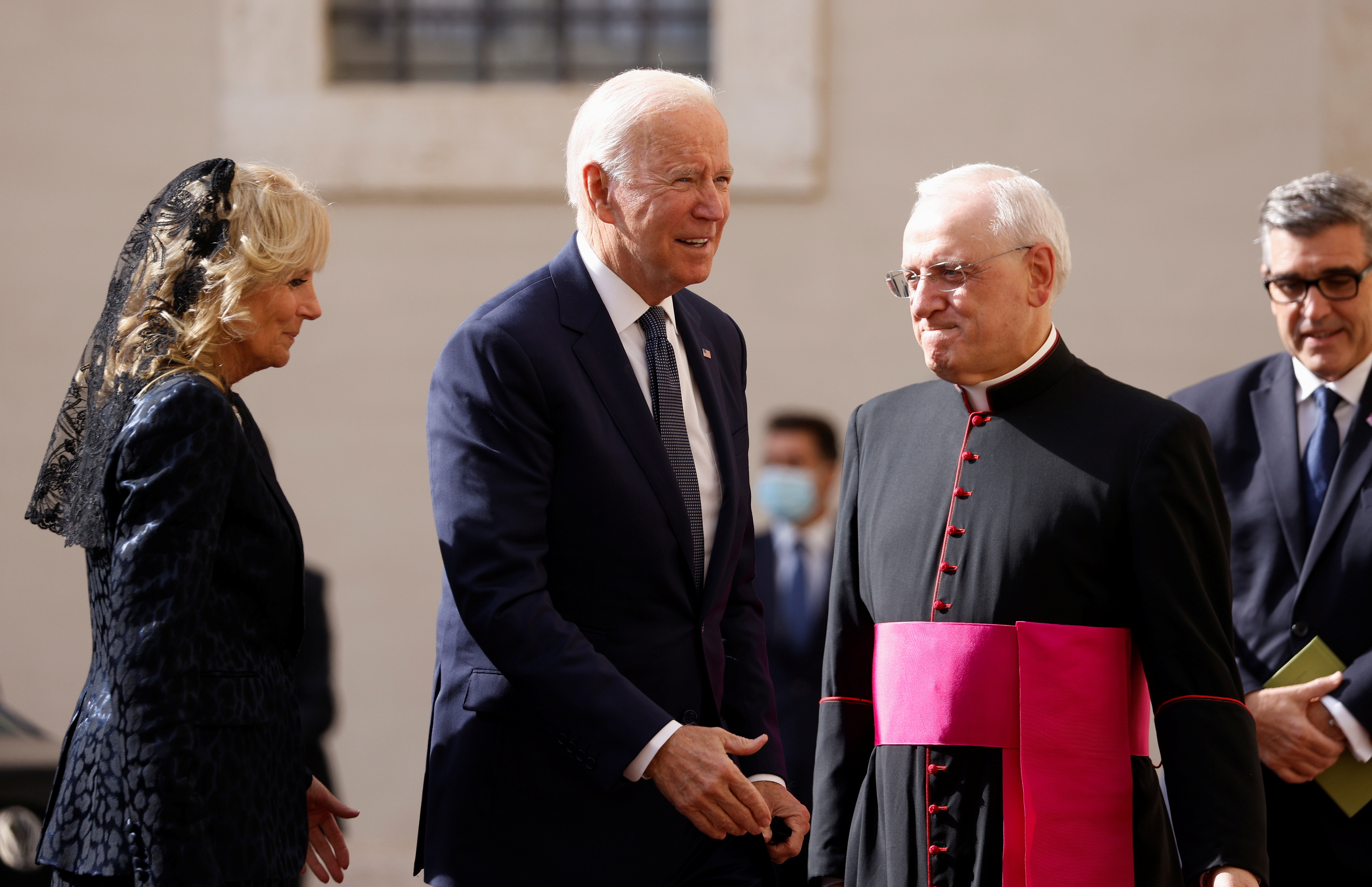 Monsignor Leonardo Sapienza receives U.S. President Joe Biden and U.S. First Lady Jill Biden as they arrive at the Vatican to meet Pope Francis, October 29, 2021. REUTERS/Guglielmo Mangiapane